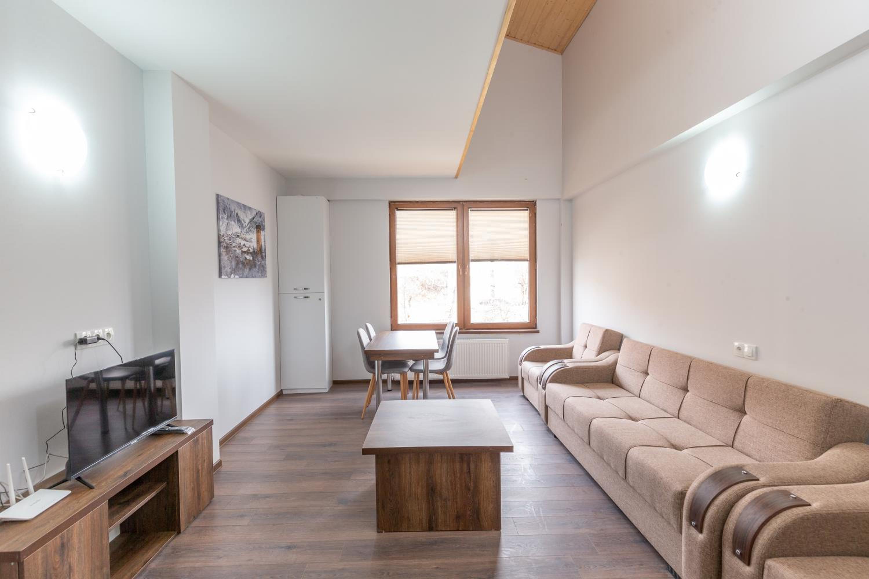 Apartment with Balcony - Photo 2