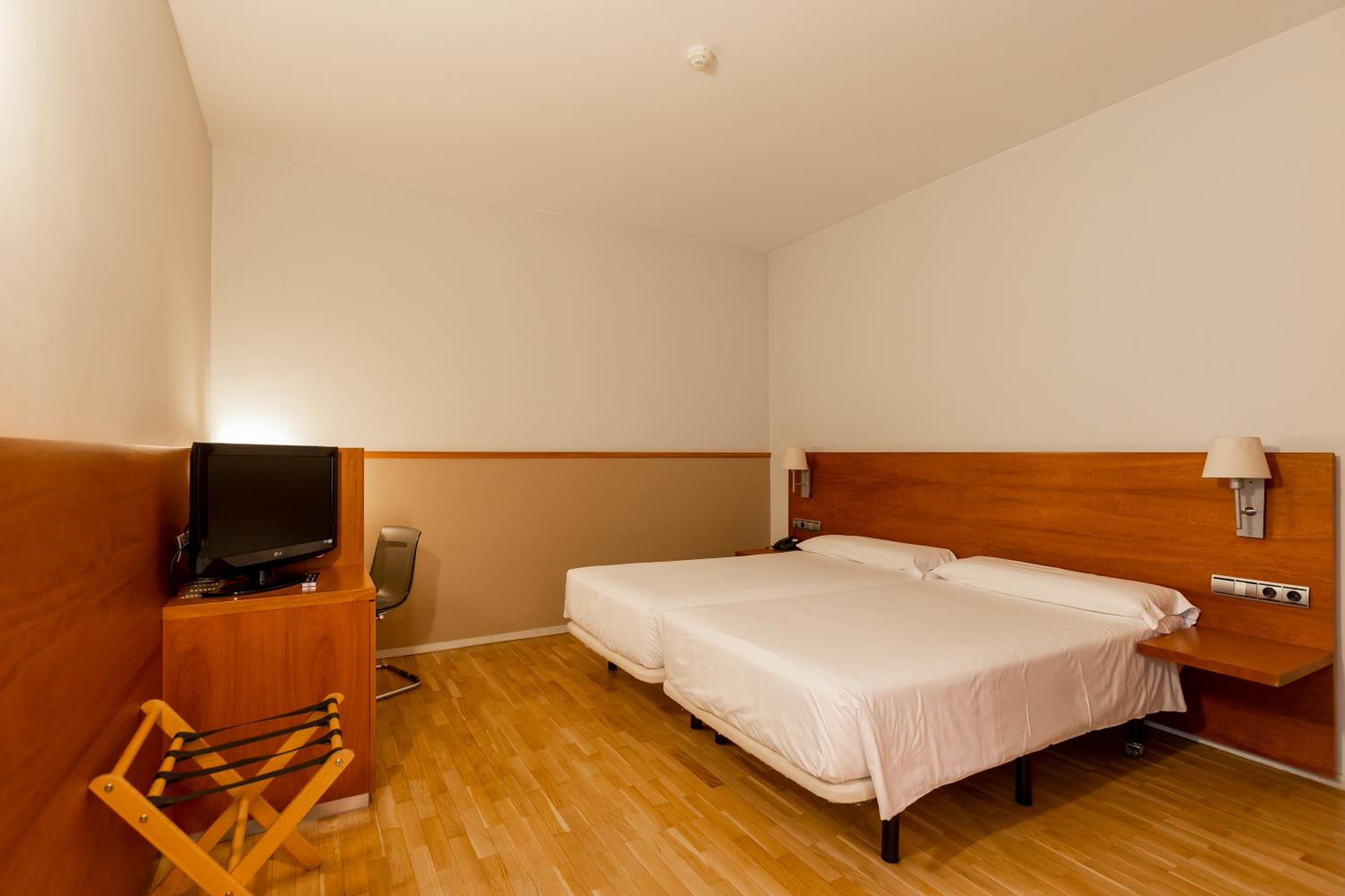 Habitación Doble o con Dos Camas (1-2 Adultos)