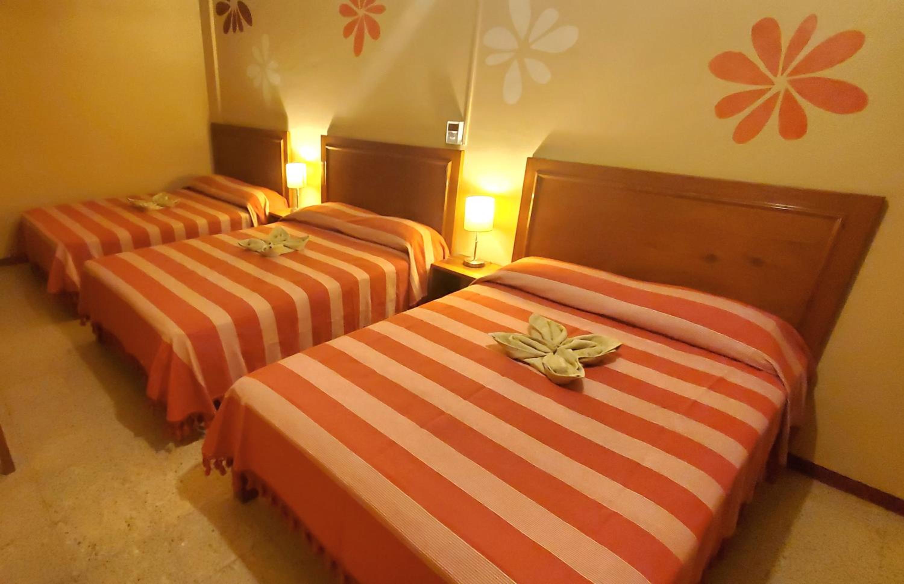 Room with Three Double Beds