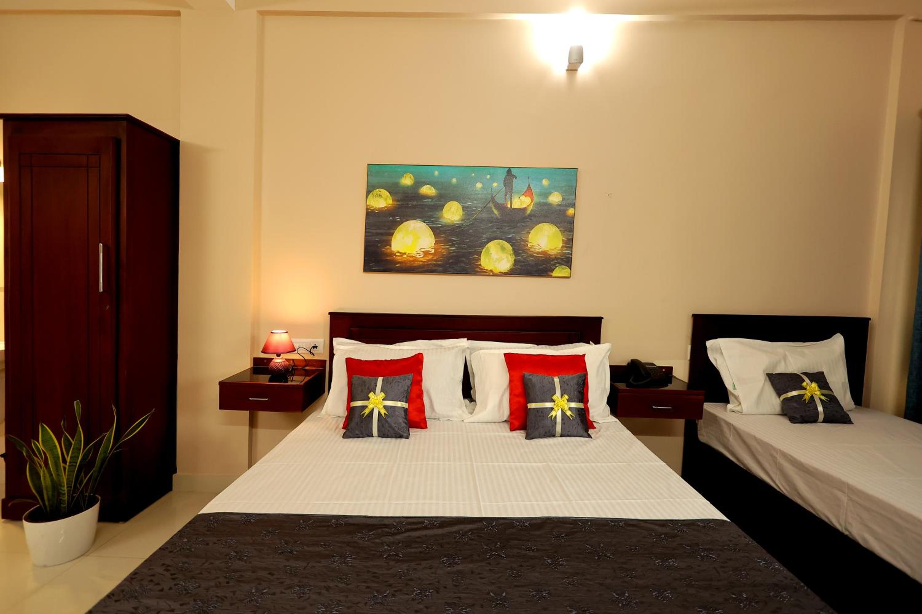 Deluxe Quadruple Room - Photo 9