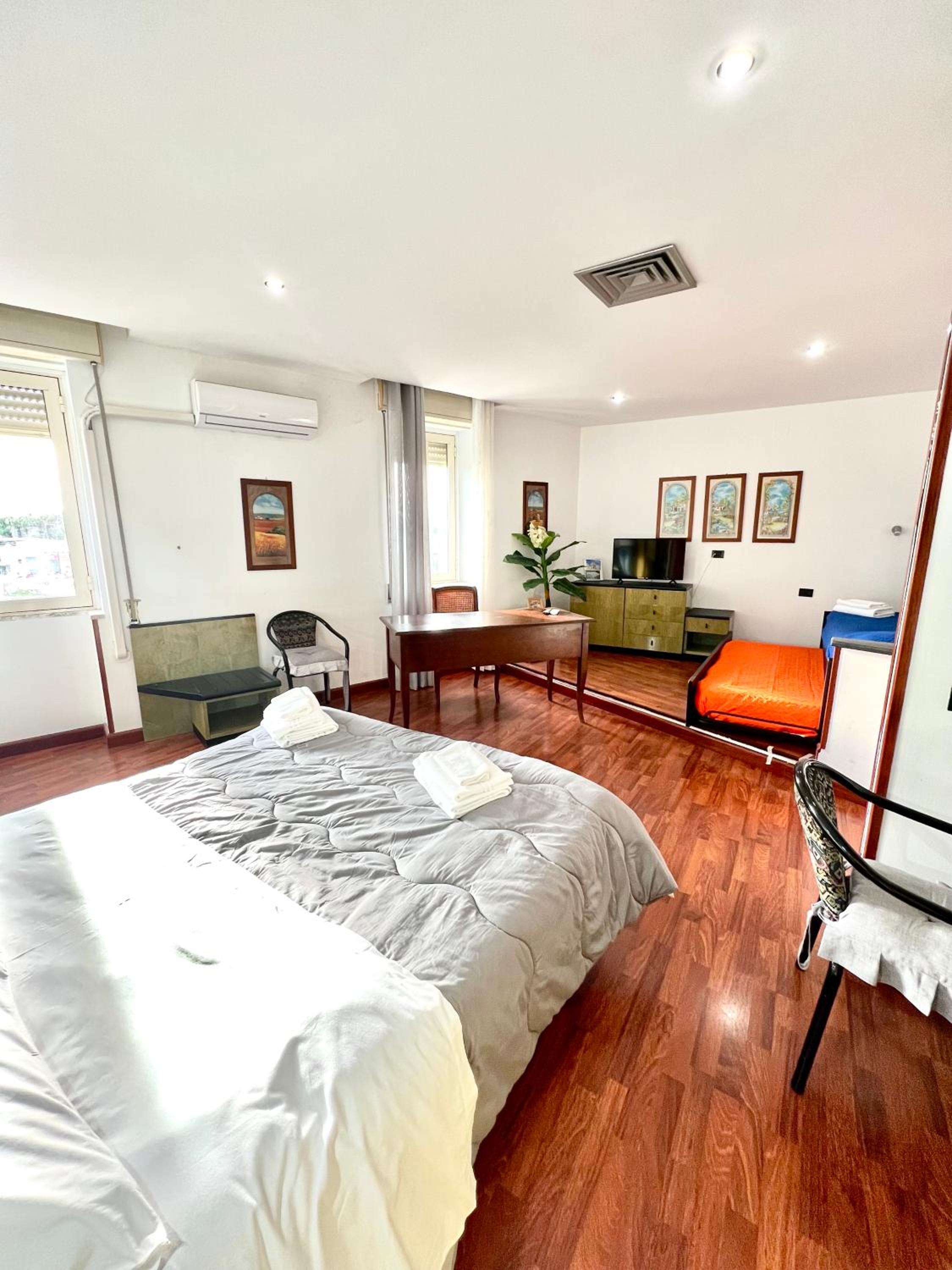 Deluxe Quadruple Room - Photo 11