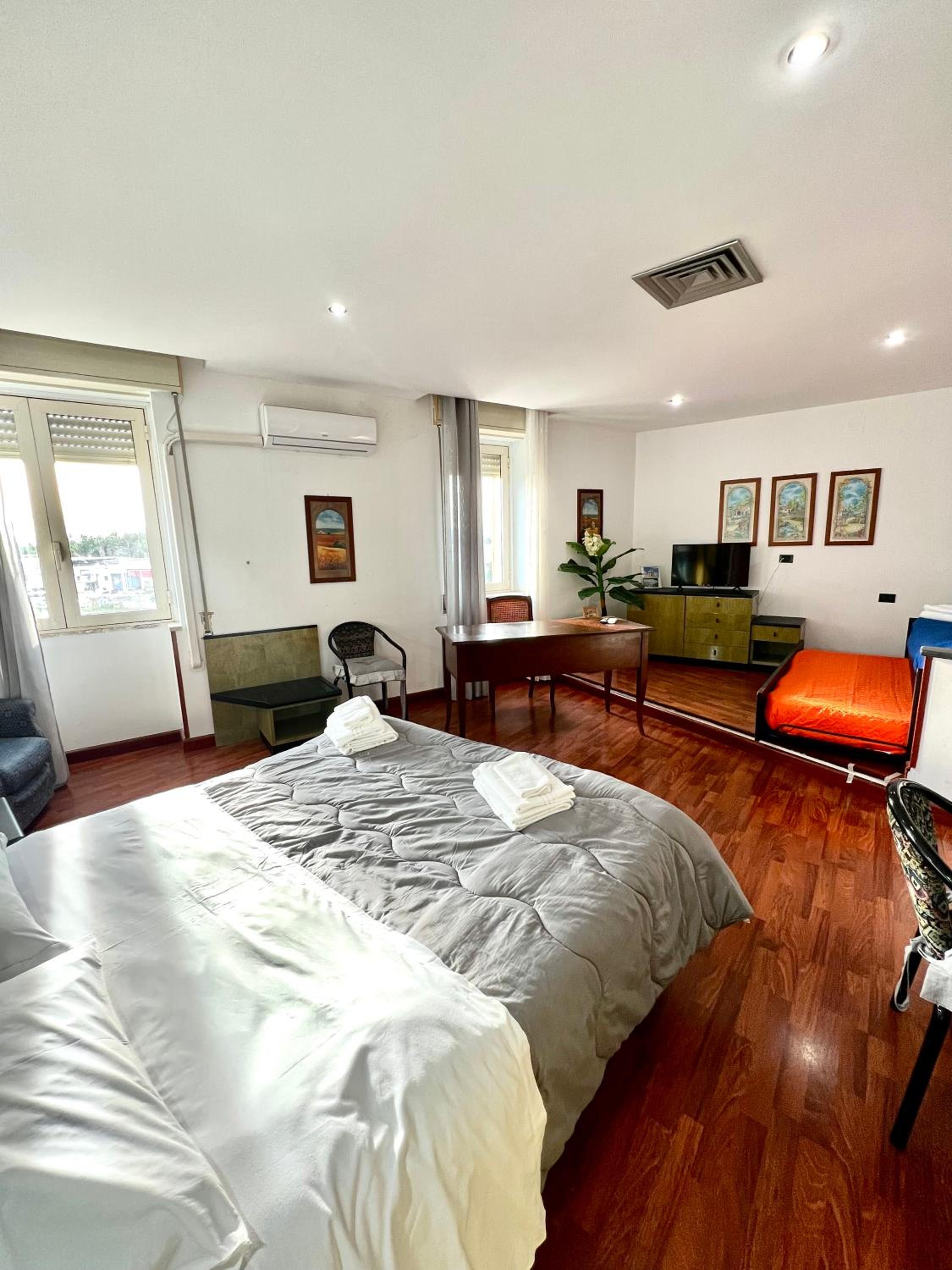 Deluxe Quadruple Room - Photo 6