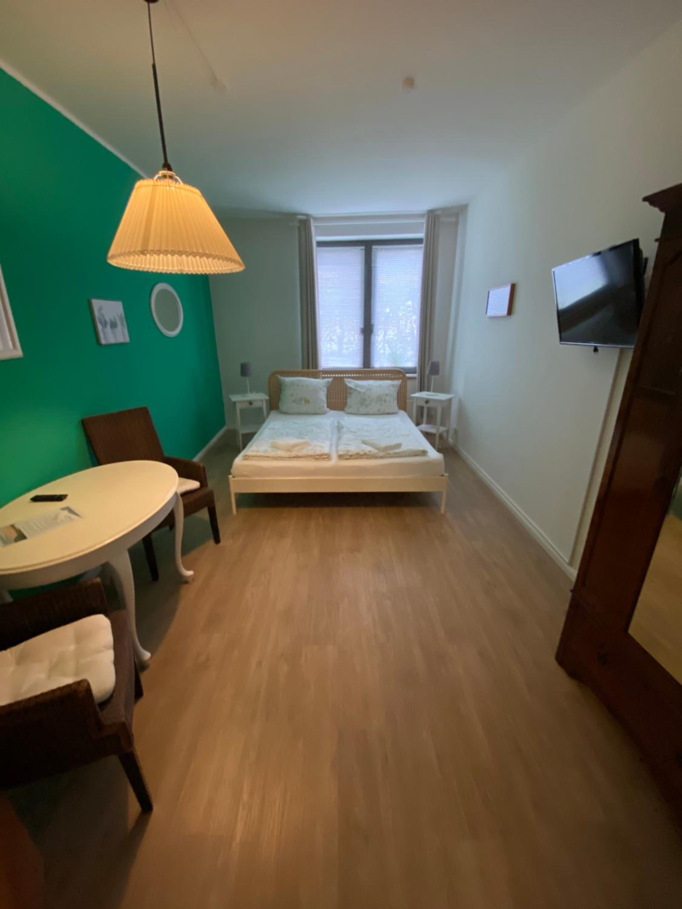 Standard Double Room with Shared Bathroom