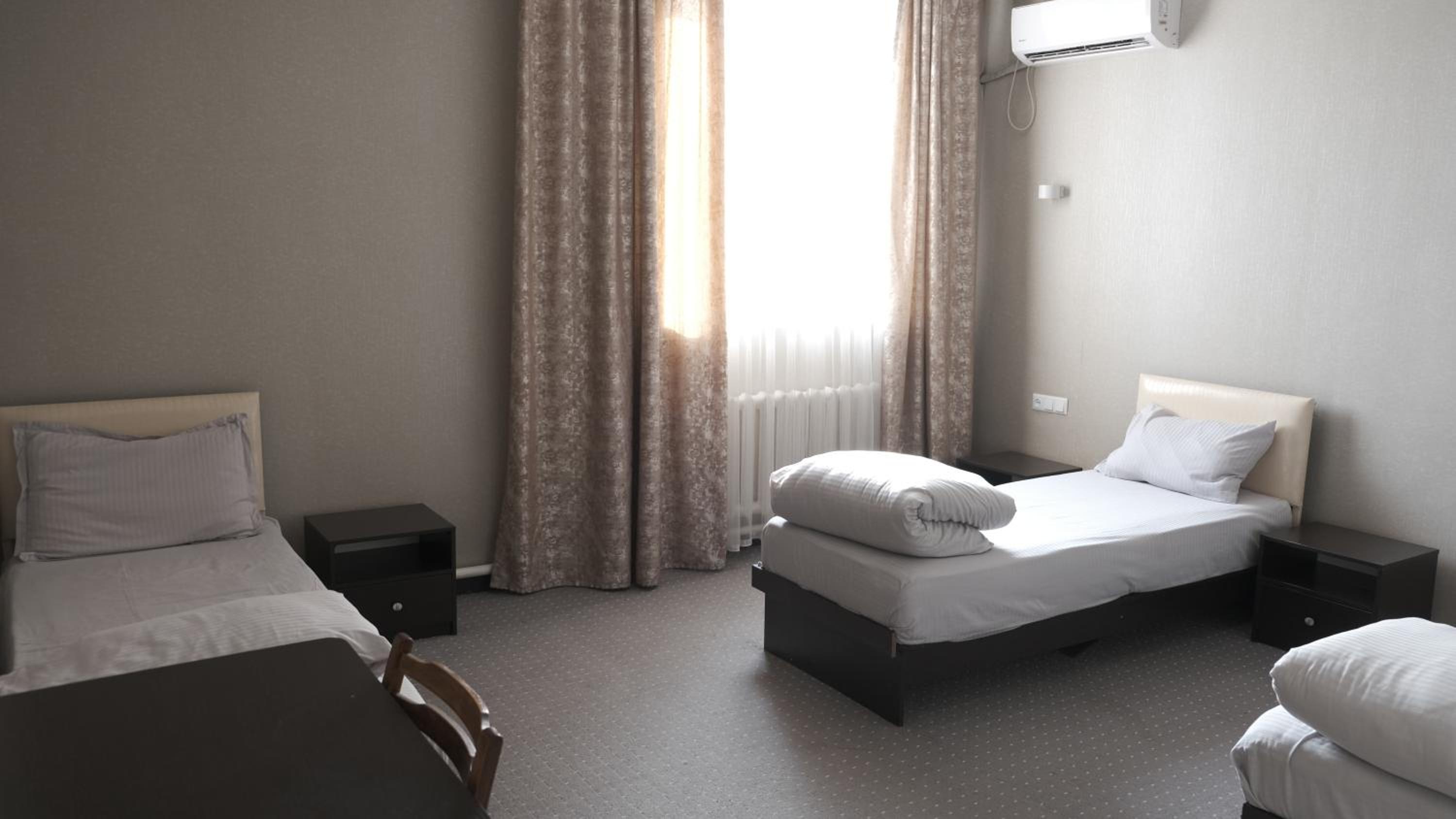 Basic Triple Room with Shared Bathroom photo 3