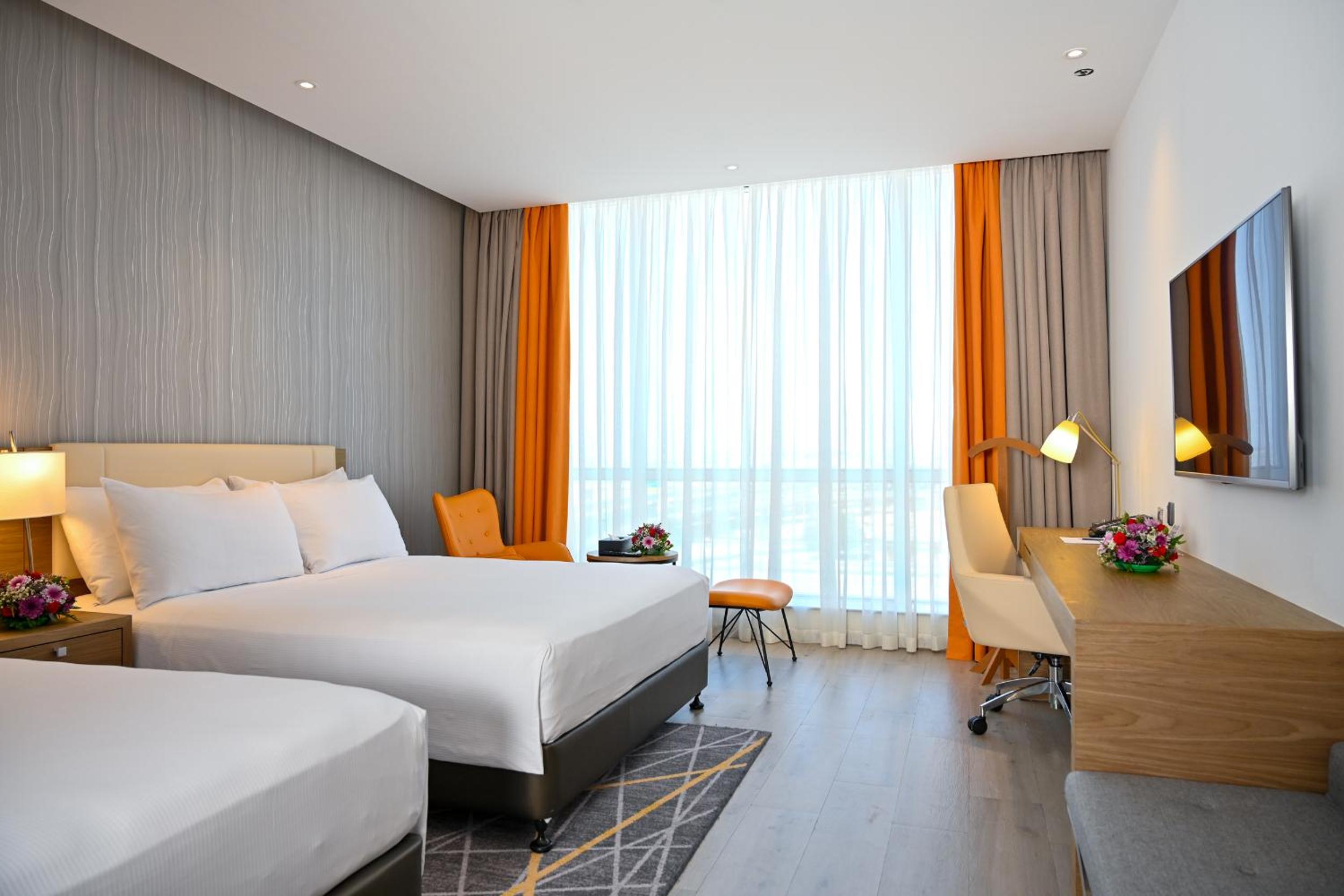 Standard Queen Room with Two Queen Beds - Photo 2
