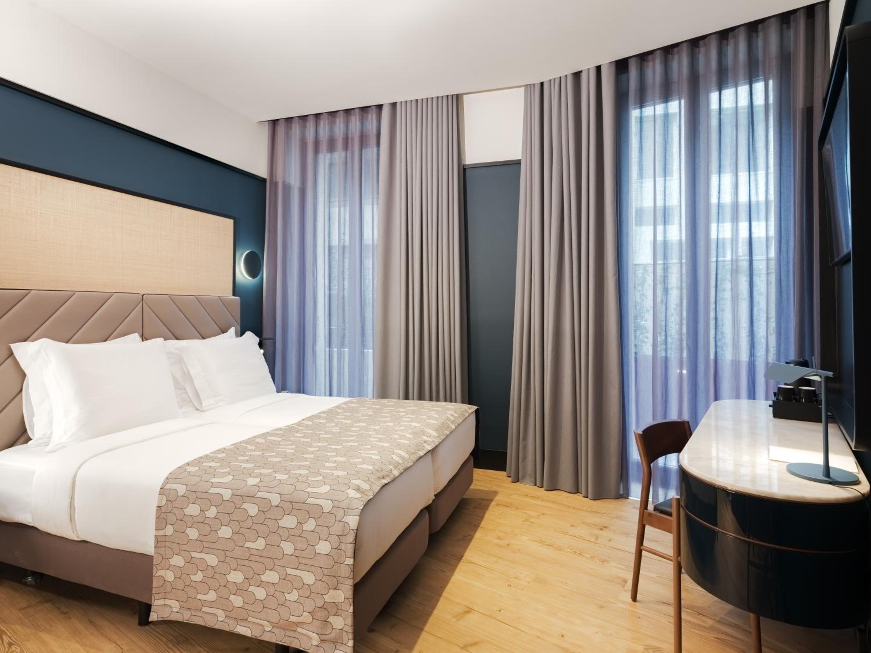 Twin Room - Photo 1