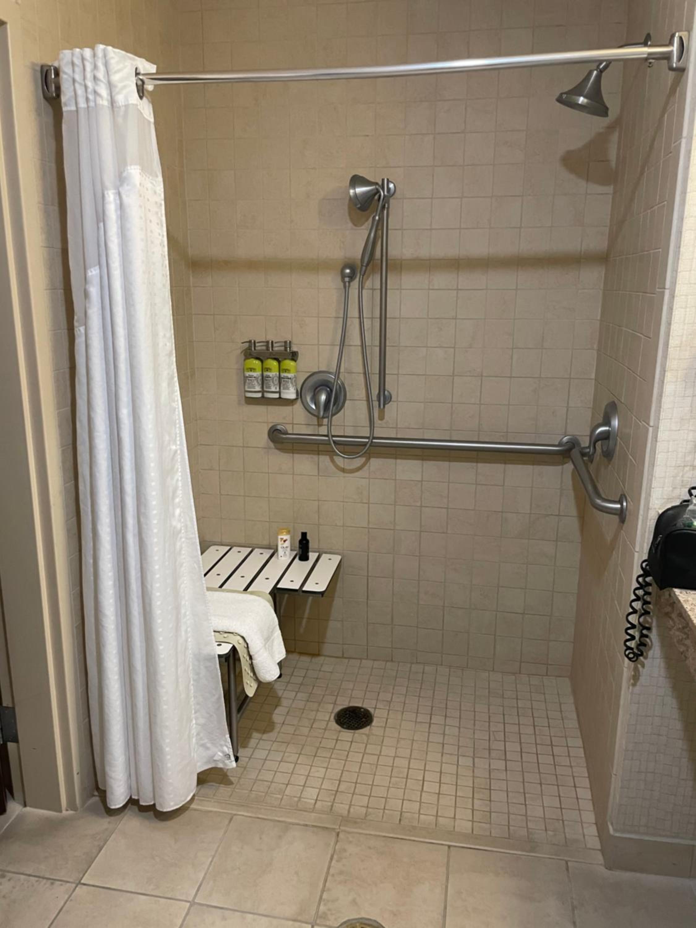 Queen Room with Two Queen Beds and Communications Mobility Accessible Roll-In Shower photo 2