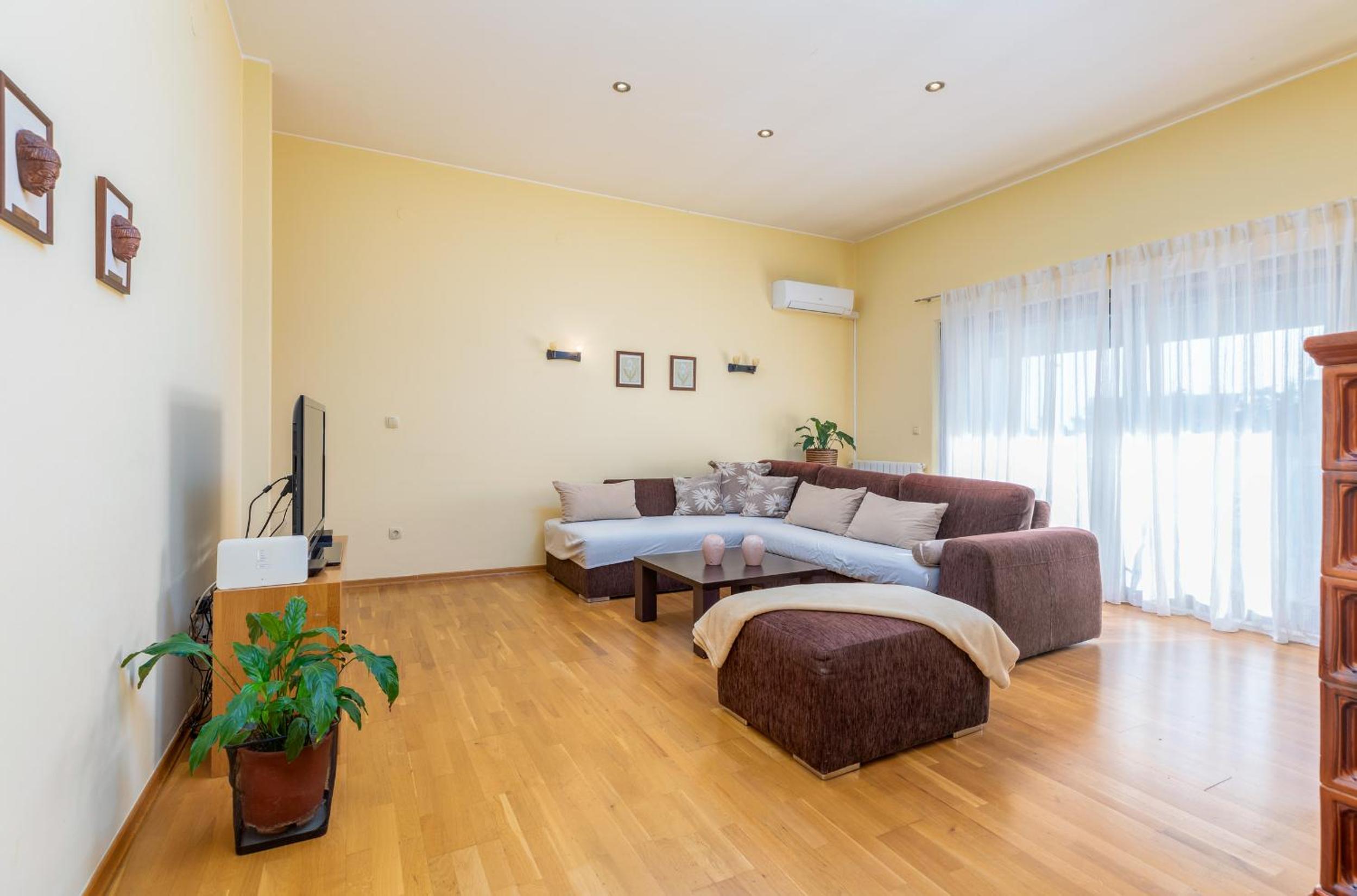 Three-Bedroom Apartment photo 1