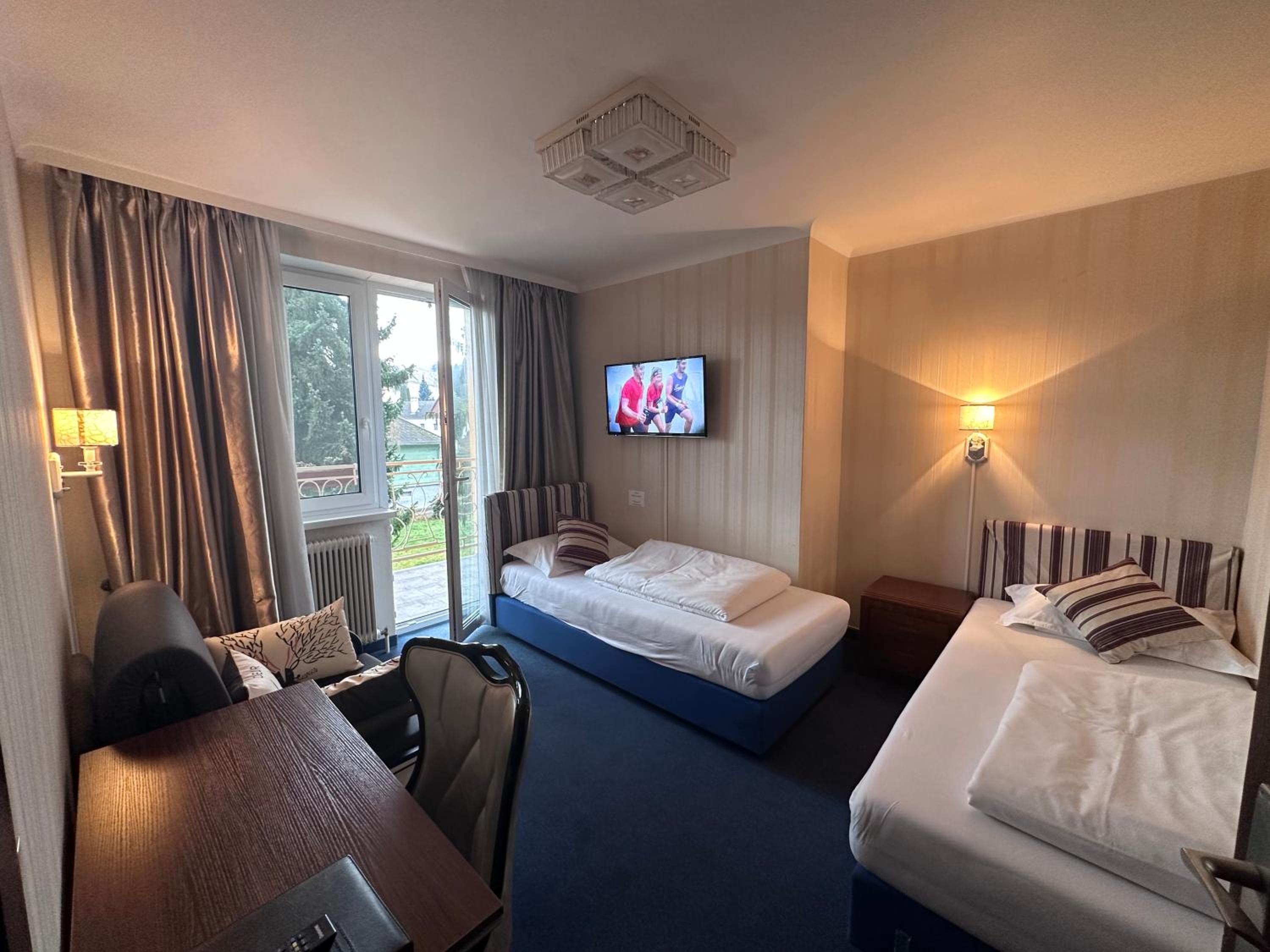 Twin Room with Balcony - Photo 1