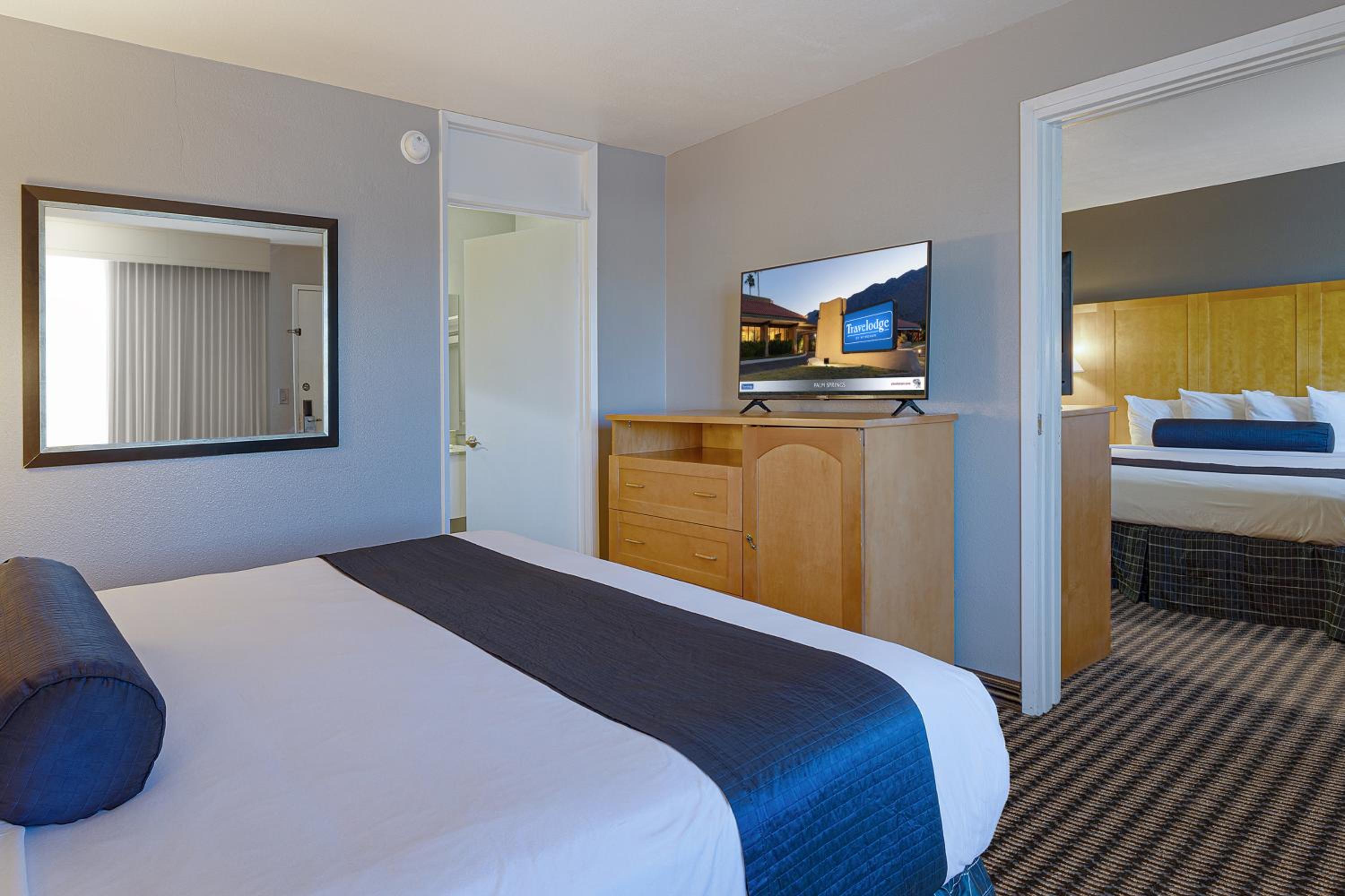 King Suite with One King and One Queen Bed - Non-Smoking - Photo 3
