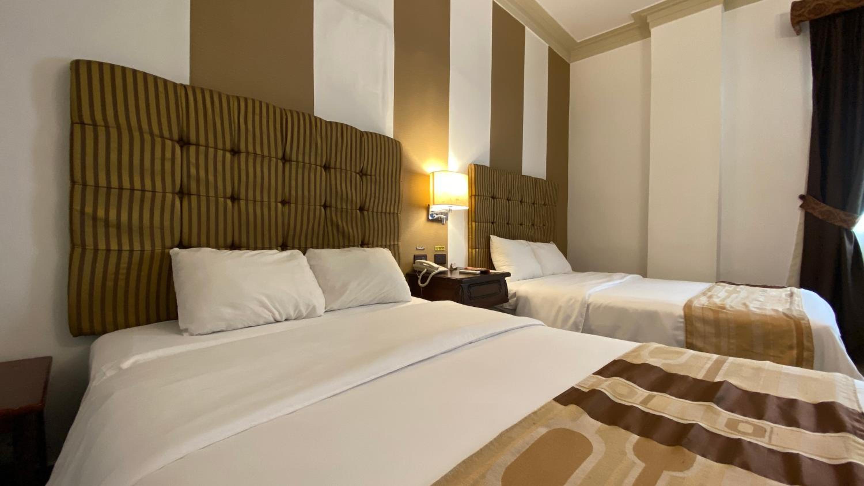 Twin Room with Two Double Beds photo 1