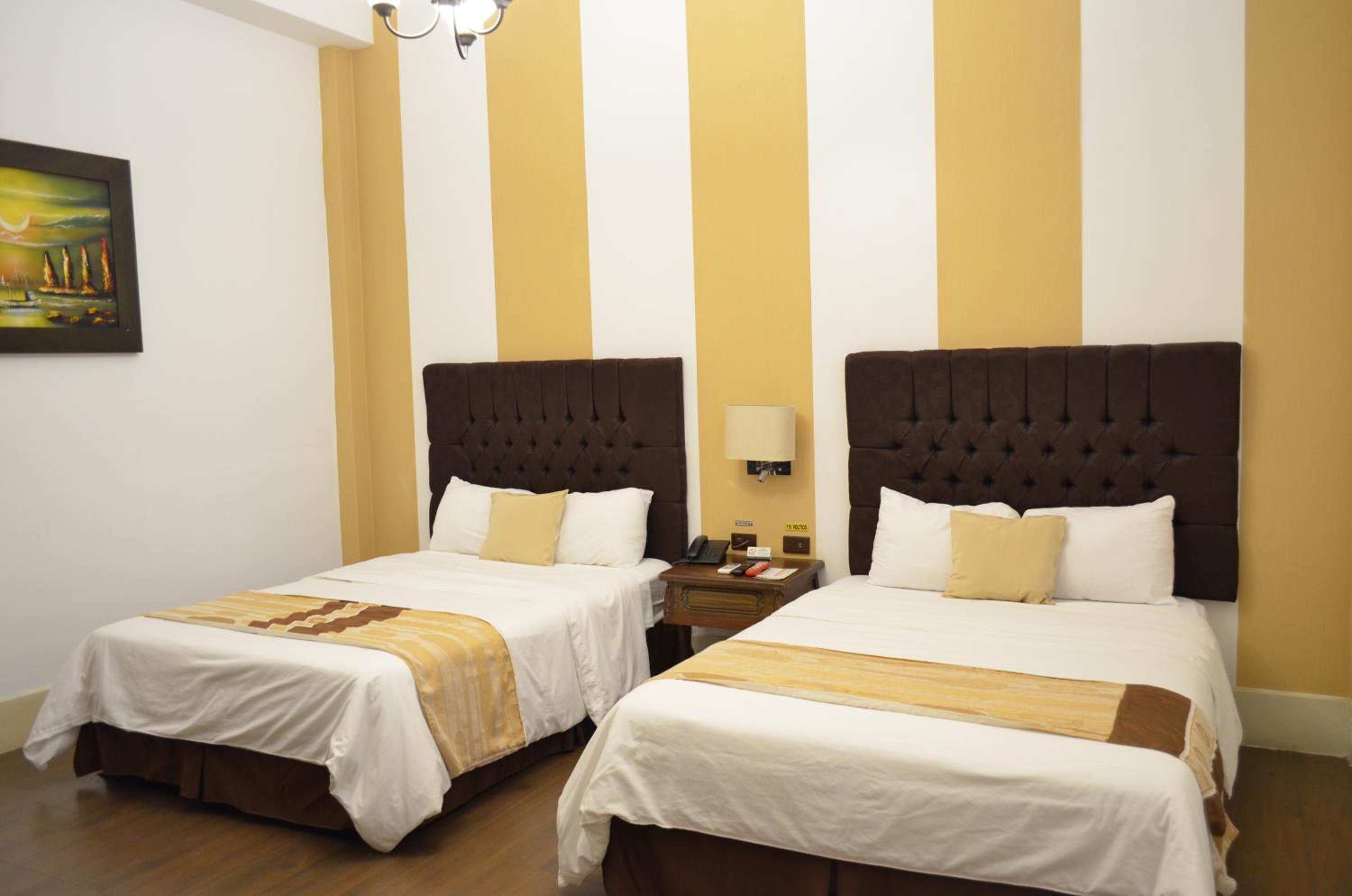 Twin Room with Two Double Beds photo 2