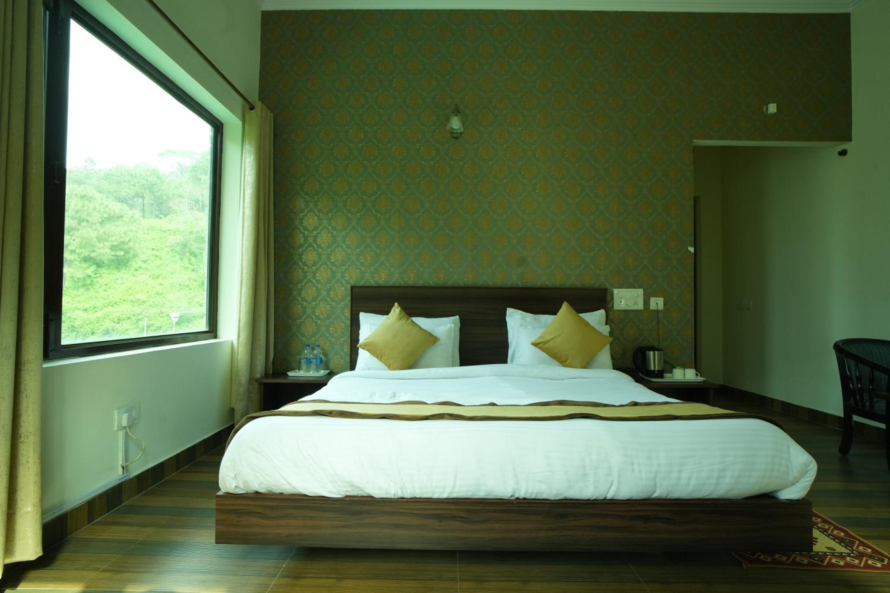 Deluxe Room - Photo 2