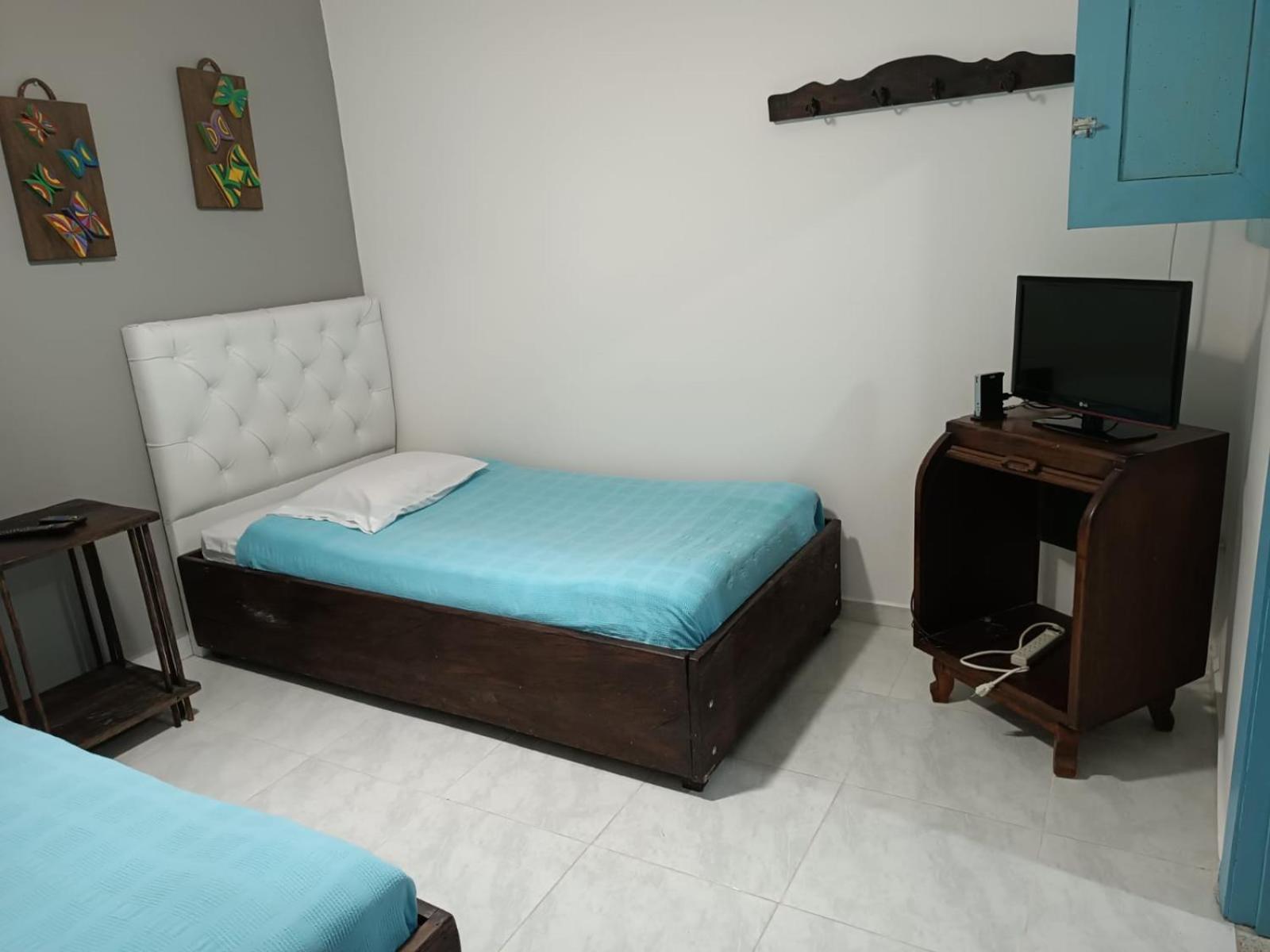 Basic Triple Room with Shared Bathroom photo 2