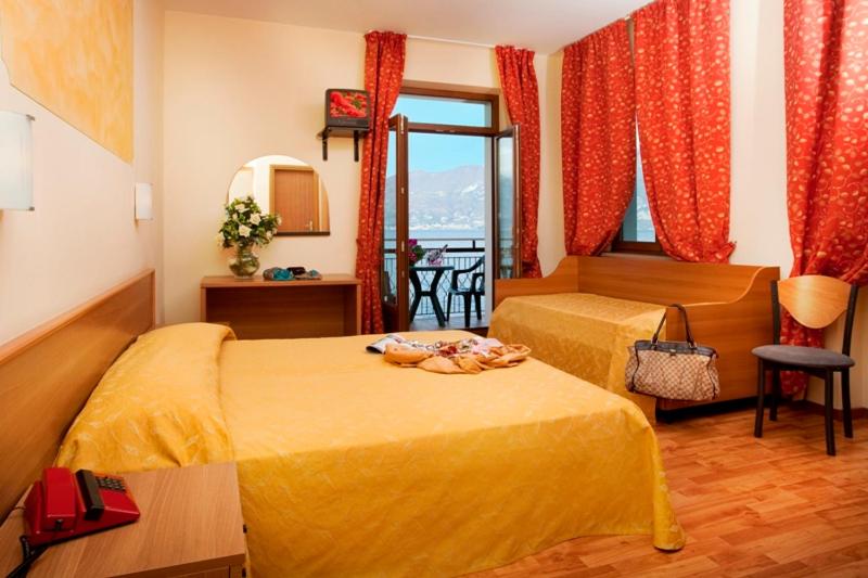 Quadruple Room with Lake View and Balcony photo 1