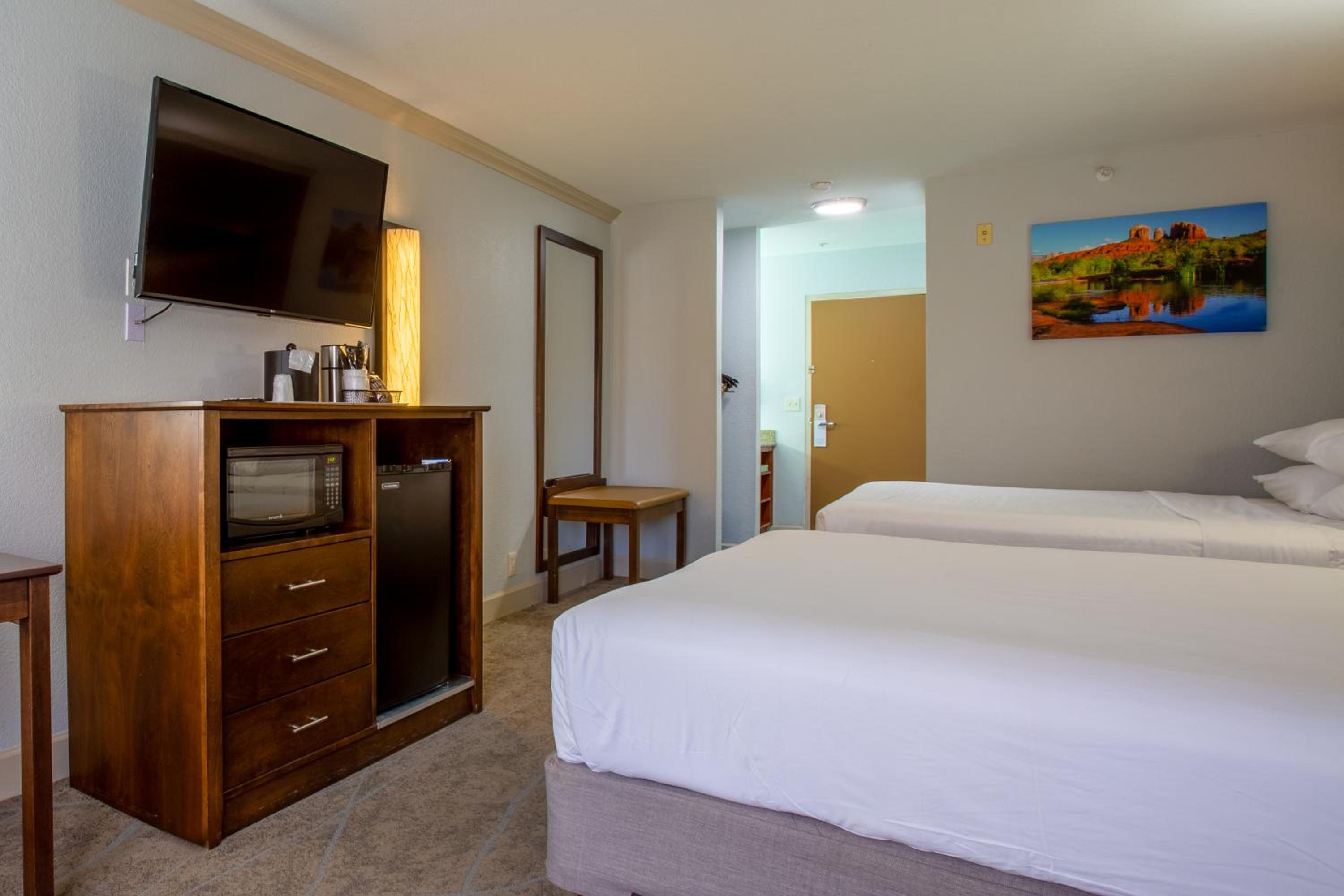 Room with Two Queen Beds and Sofa - Photo 4