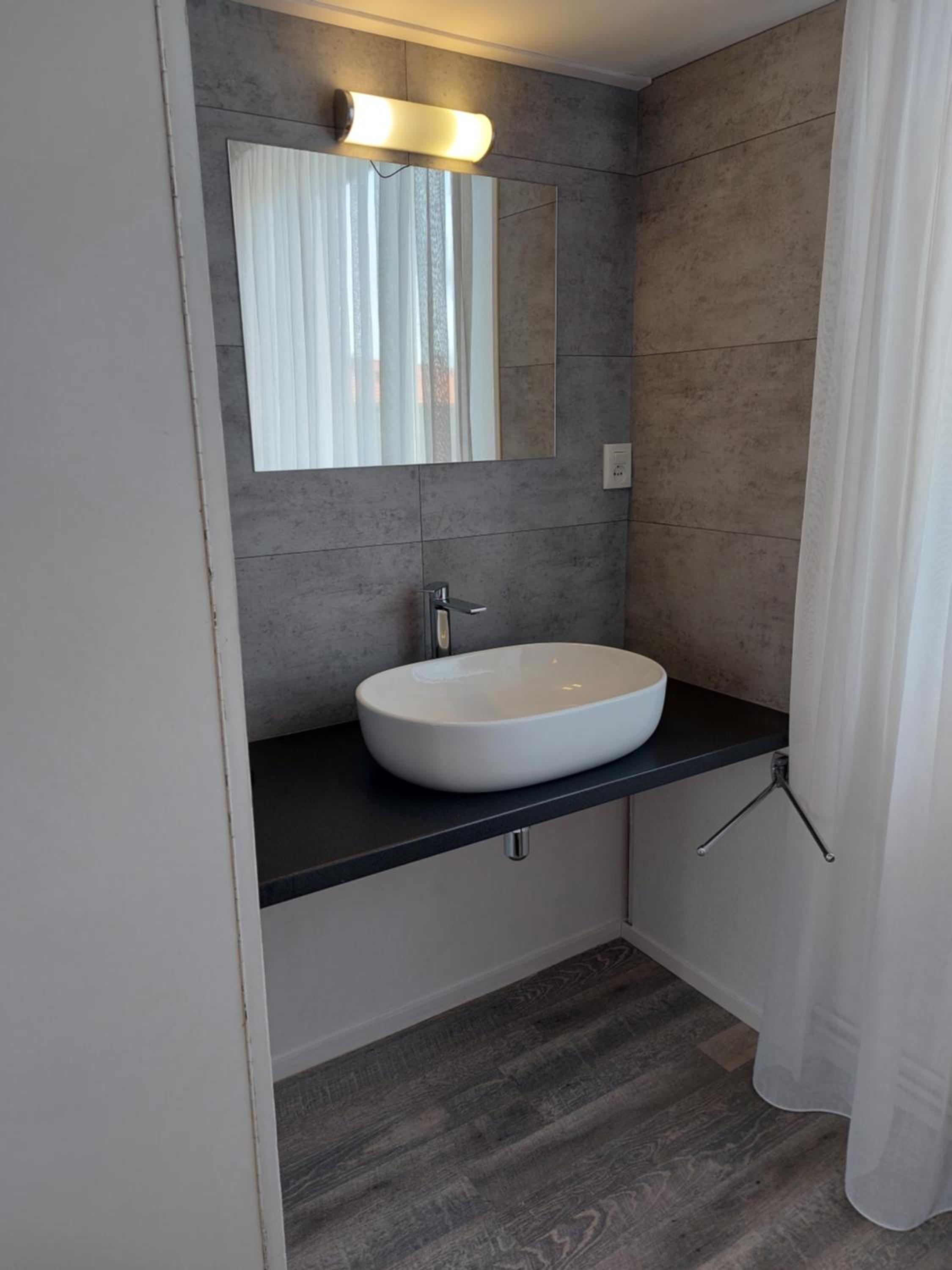 Three-Bedroom Apartment - Photo 6