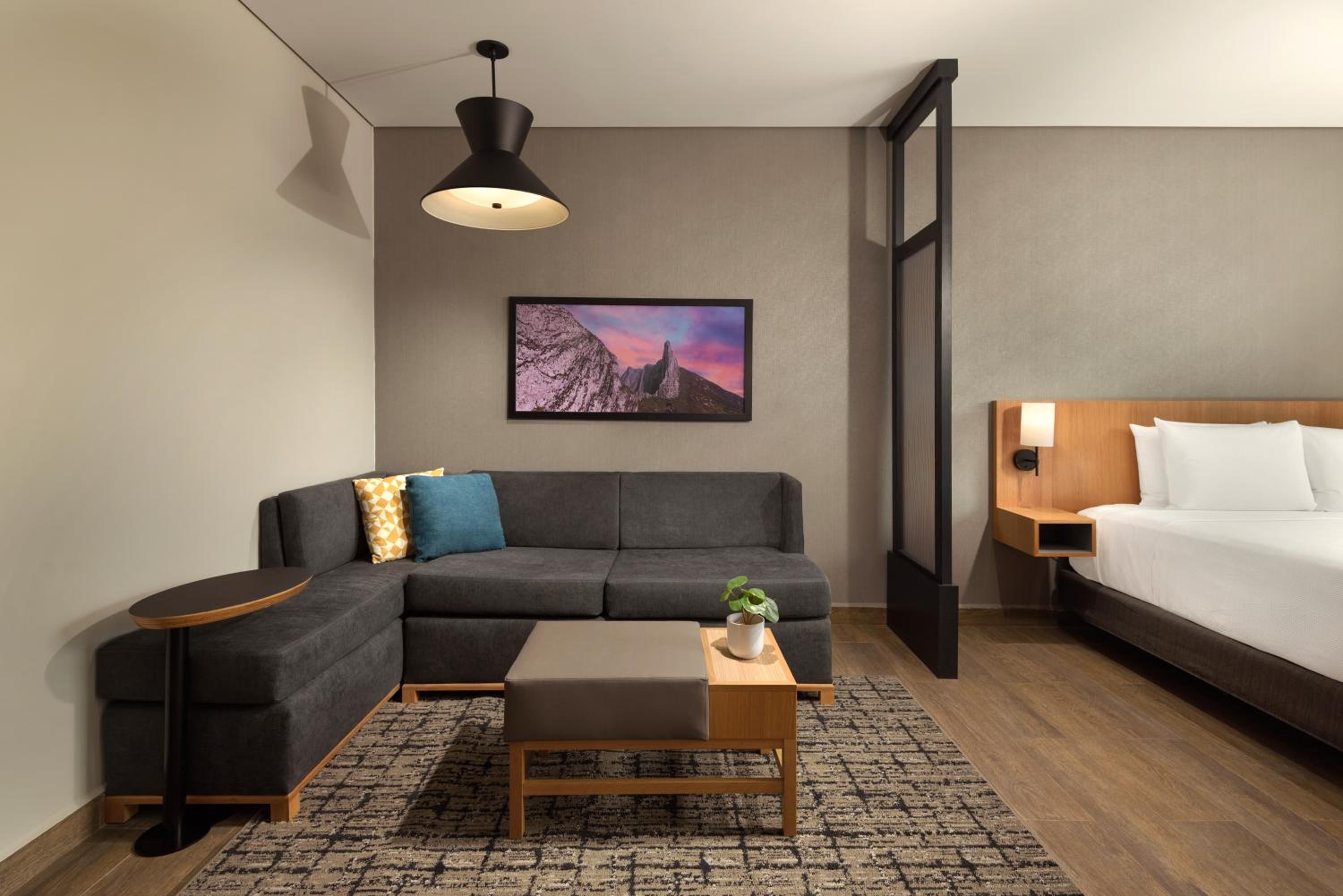 Queen Room with Two Queen Beds and Sofa Bed - Photo 5