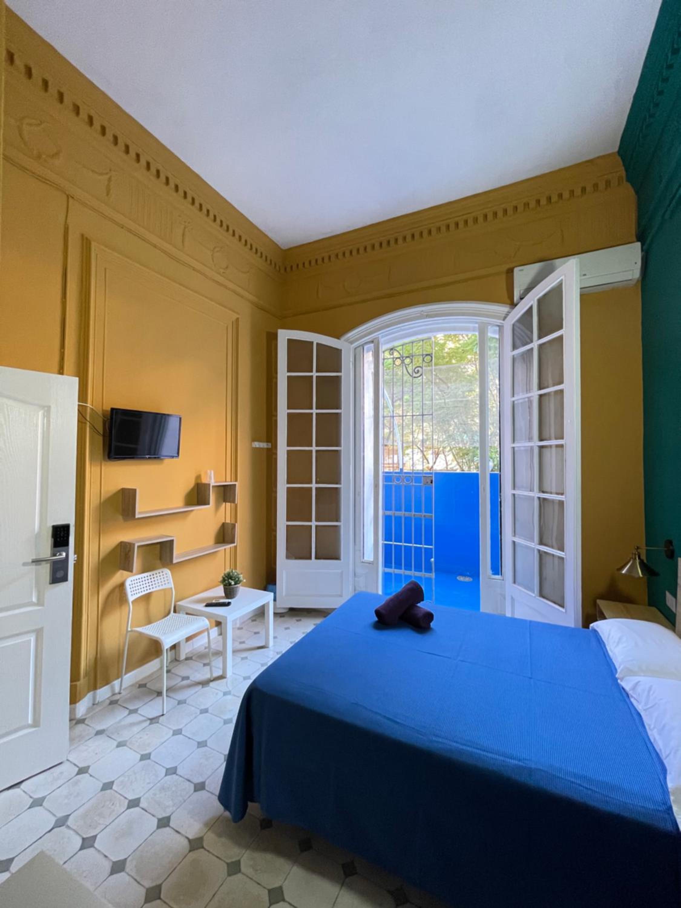 Habitación Doble con Terraza y Baño Compartido