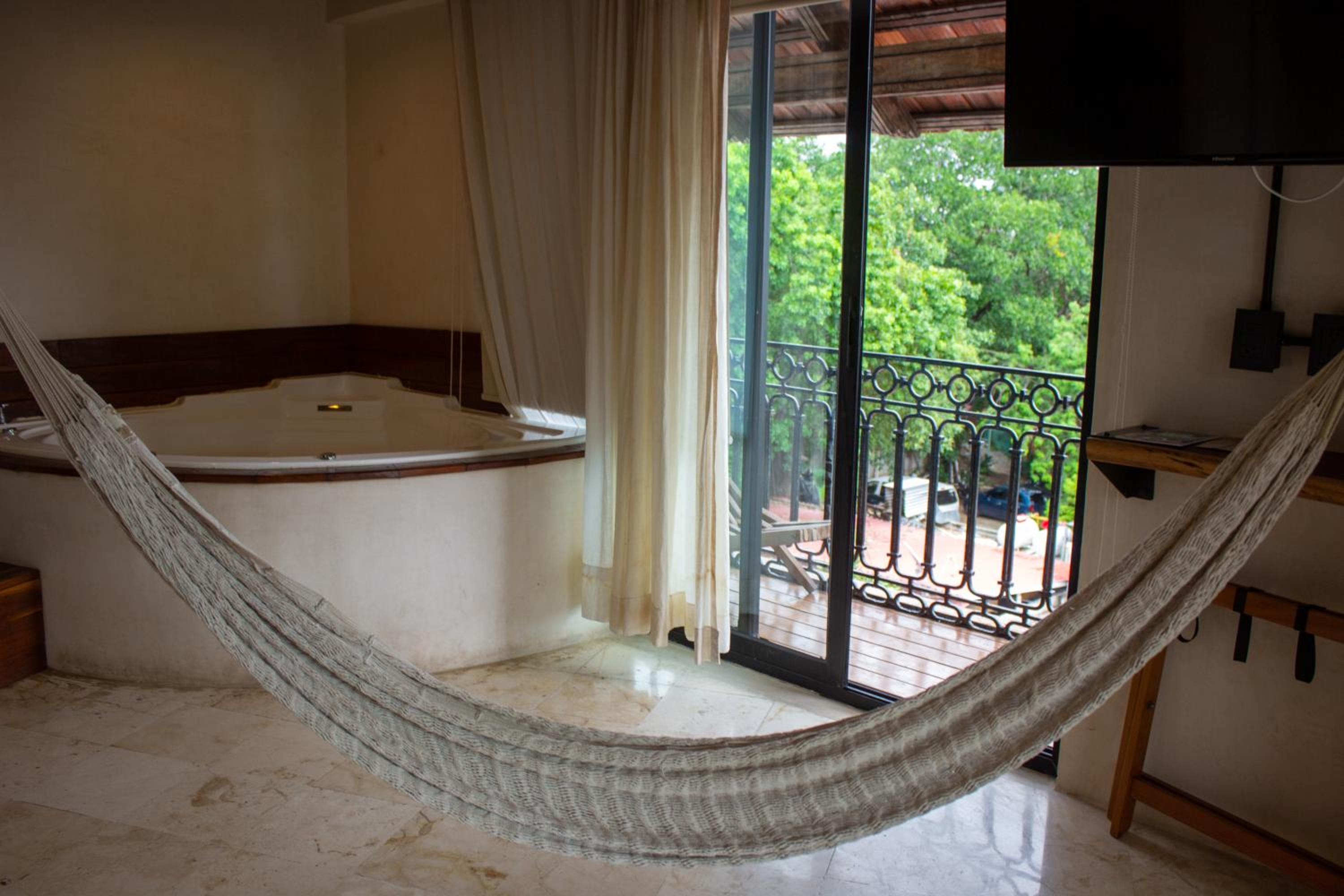 Master Suite with Jacuzzi, Balcony and City Views - Photo 7