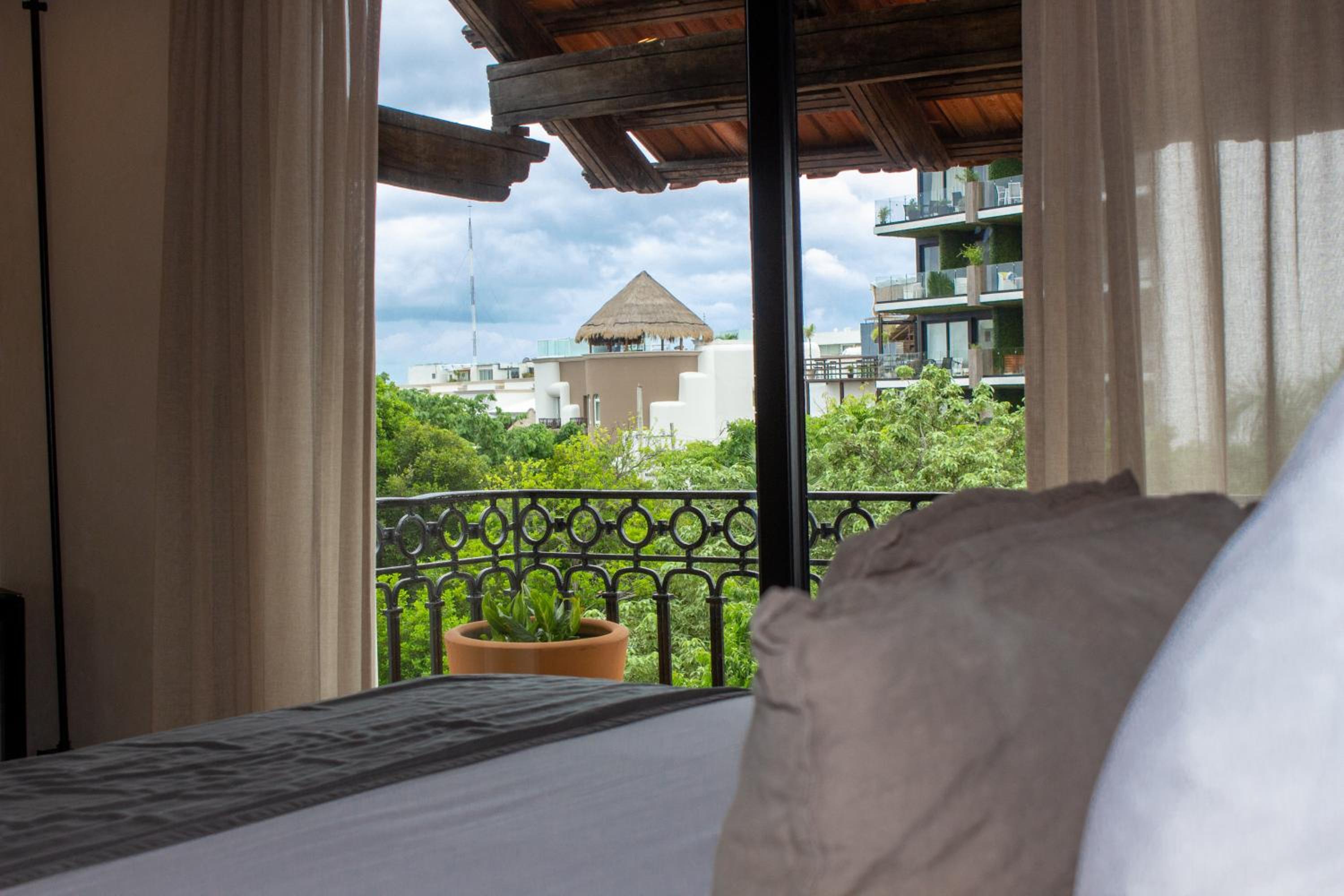 Master Suite with Jacuzzi, Balcony and City Views - Photo 6