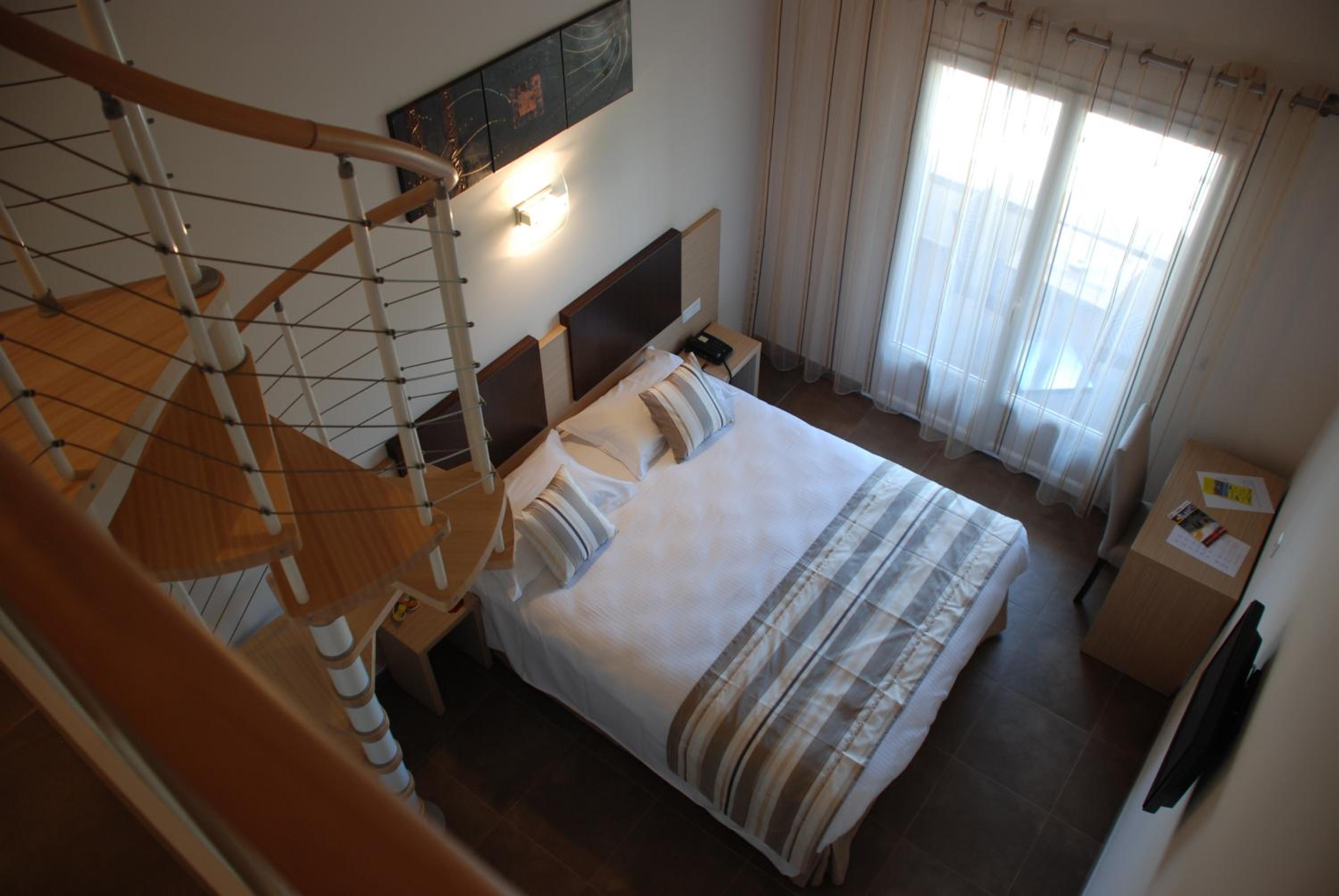 Quadruple Room - Photo 1