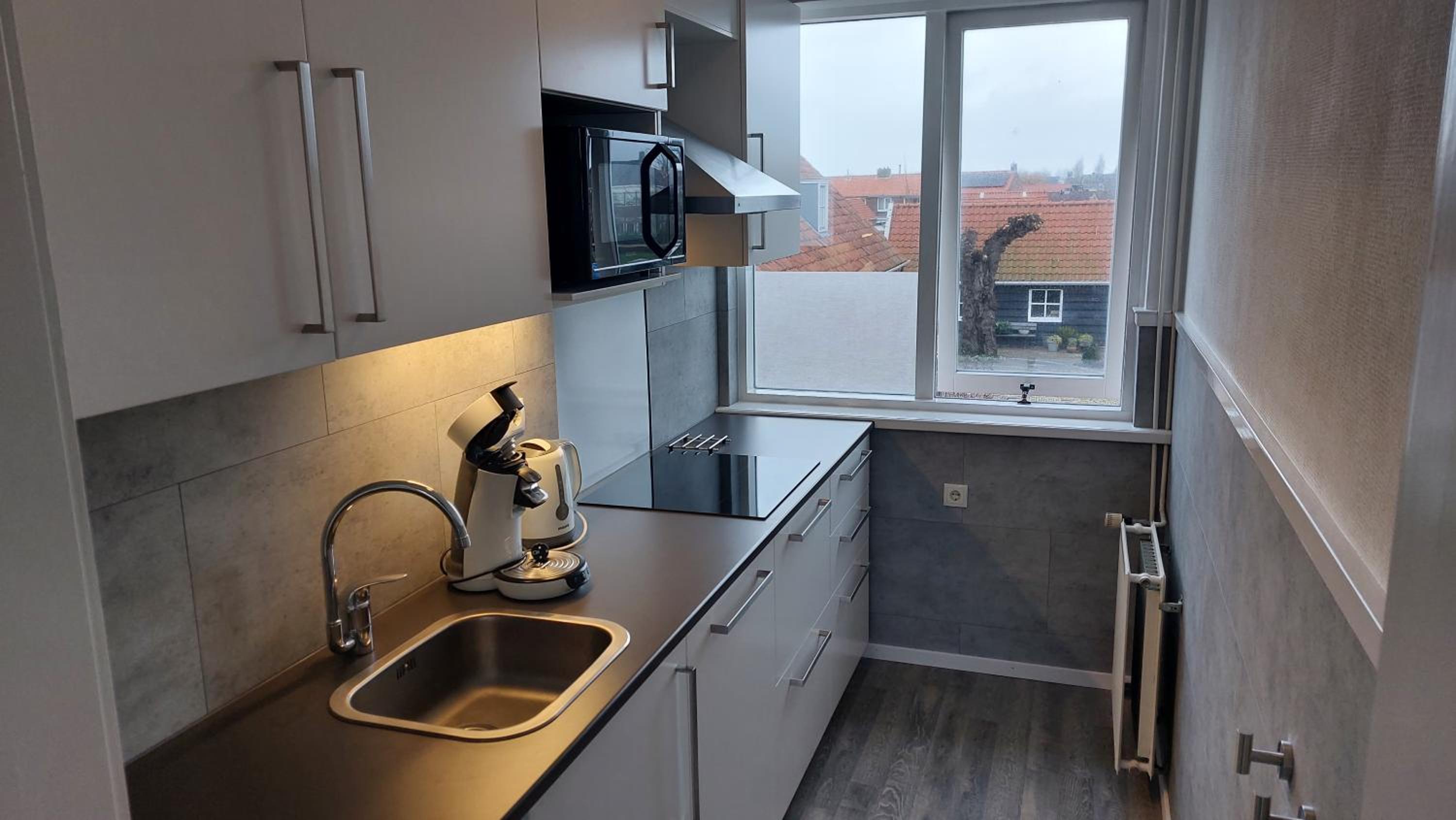 Three-Bedroom Apartment - Photo 8