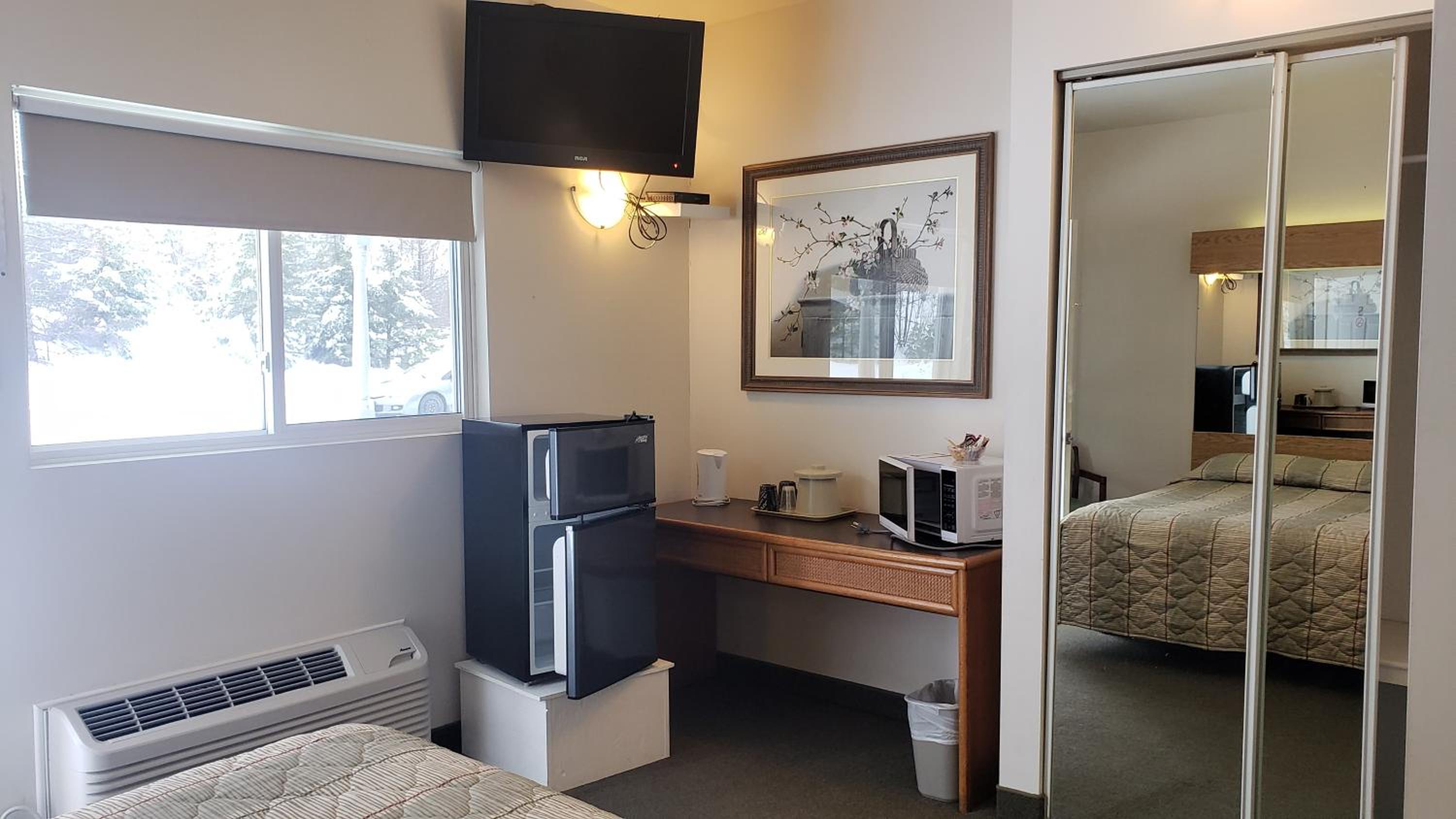 Deluxe Queen Room with Two Queen Beds - Photo 1