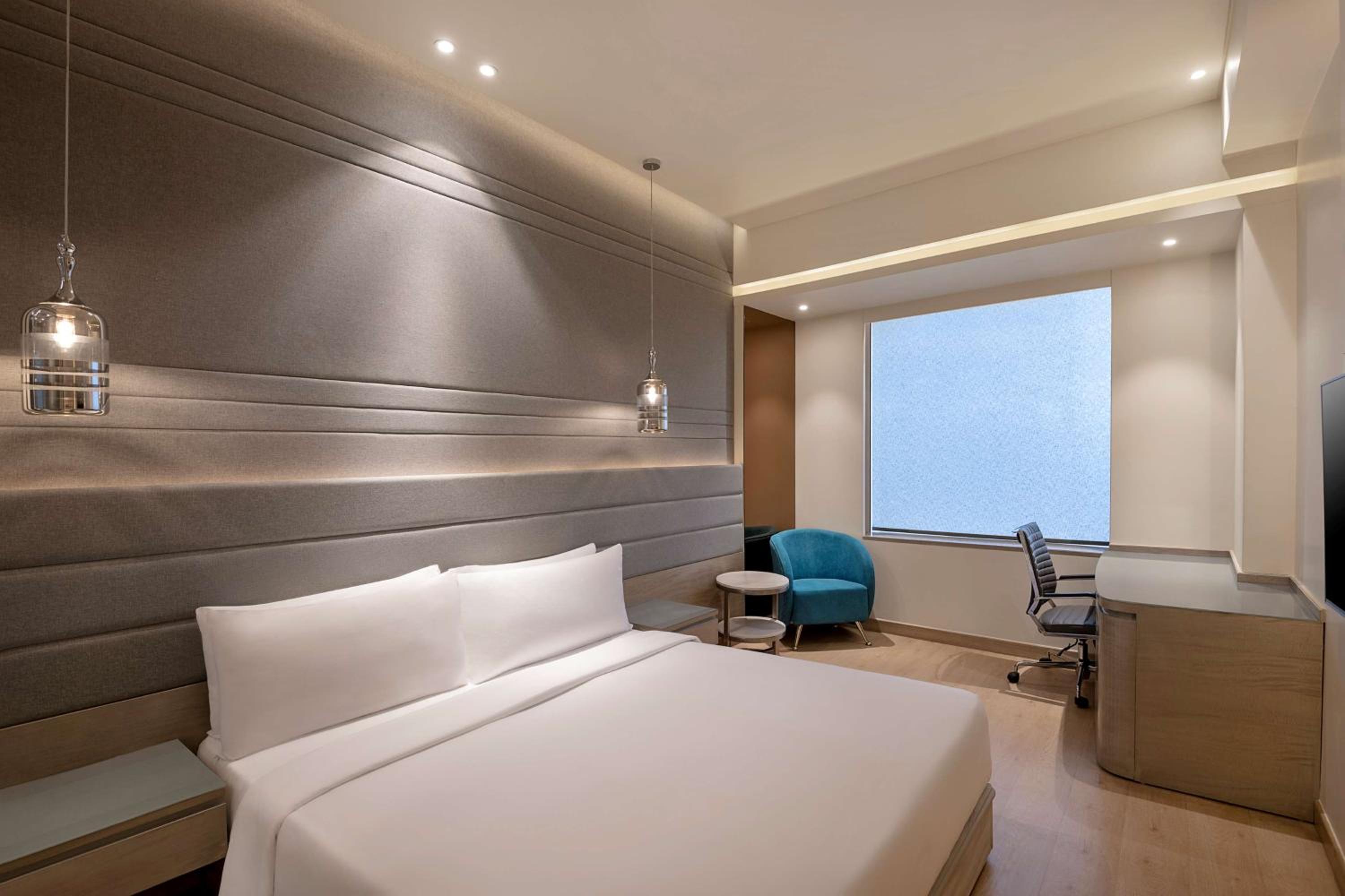 Business Class Room - 1+1 on selected brands during Happy hours (6pm to 8pm) at Sky Grill bar, 20% discount on F&B amd Concierge ((Airport/Railway station/office Etc.. pickup & Drop ).