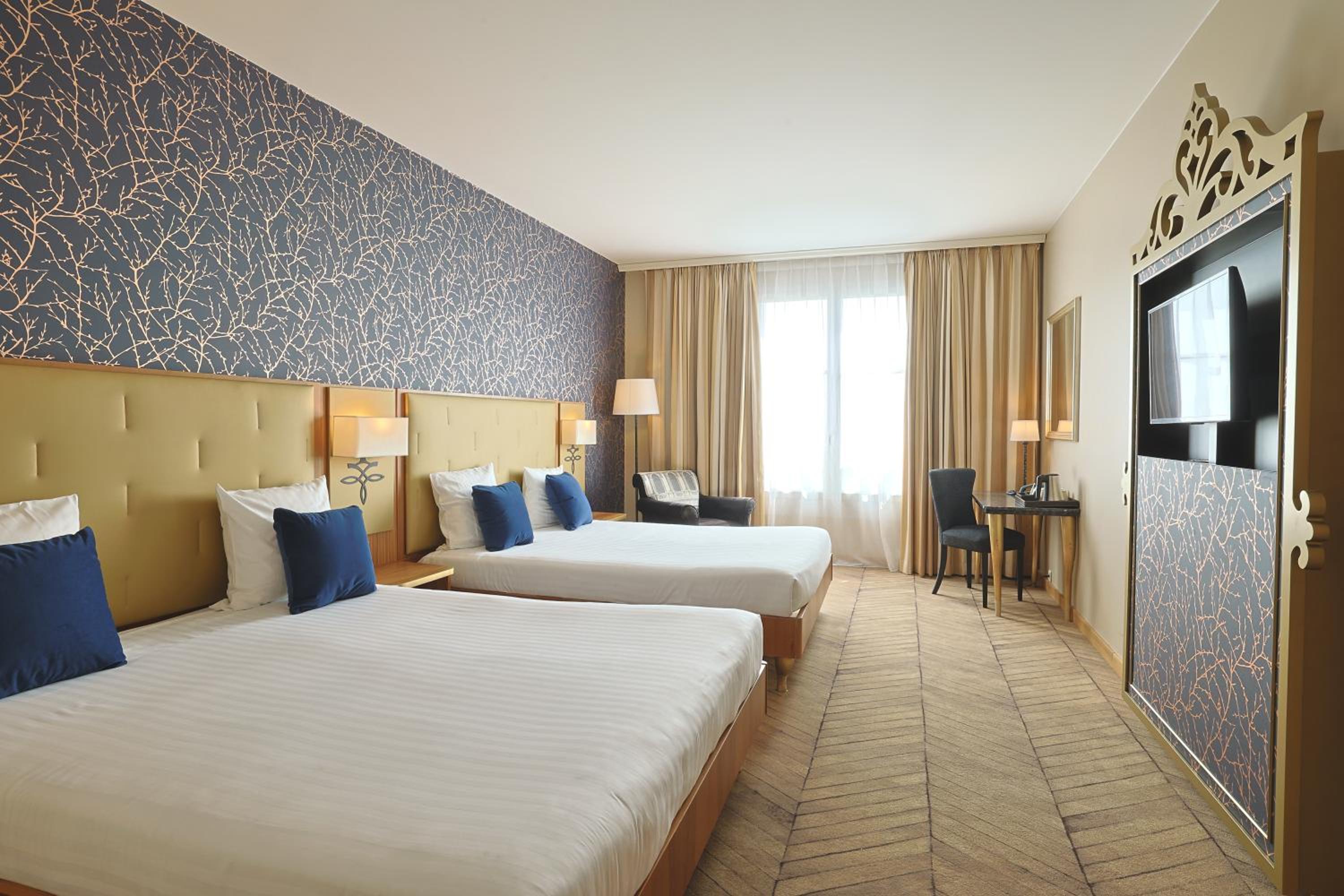 Chambre Quadruple avec Accès au Spa (2 Lits Queen-Size)