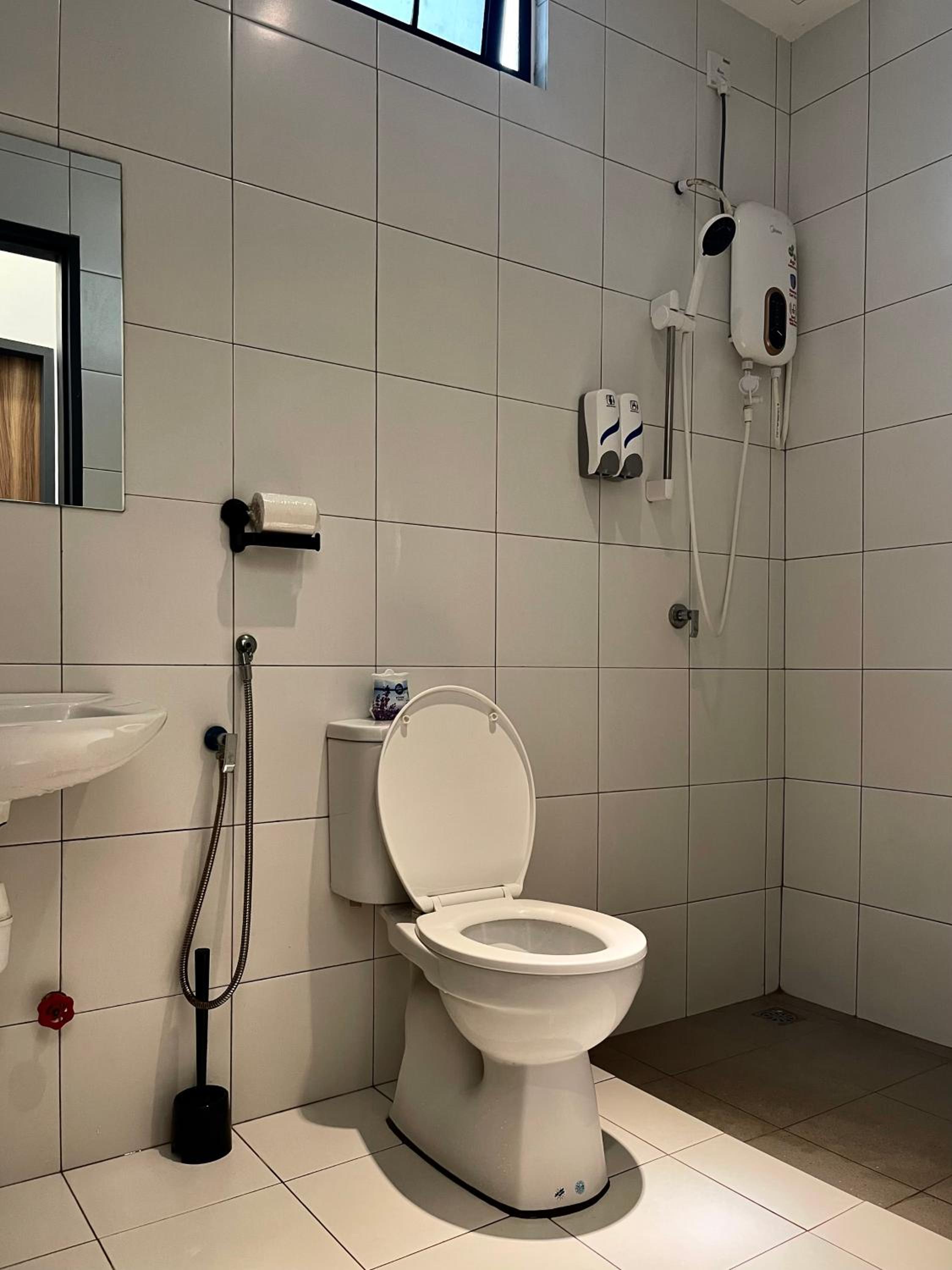 Three-Bedroom Apartment - Photo 19