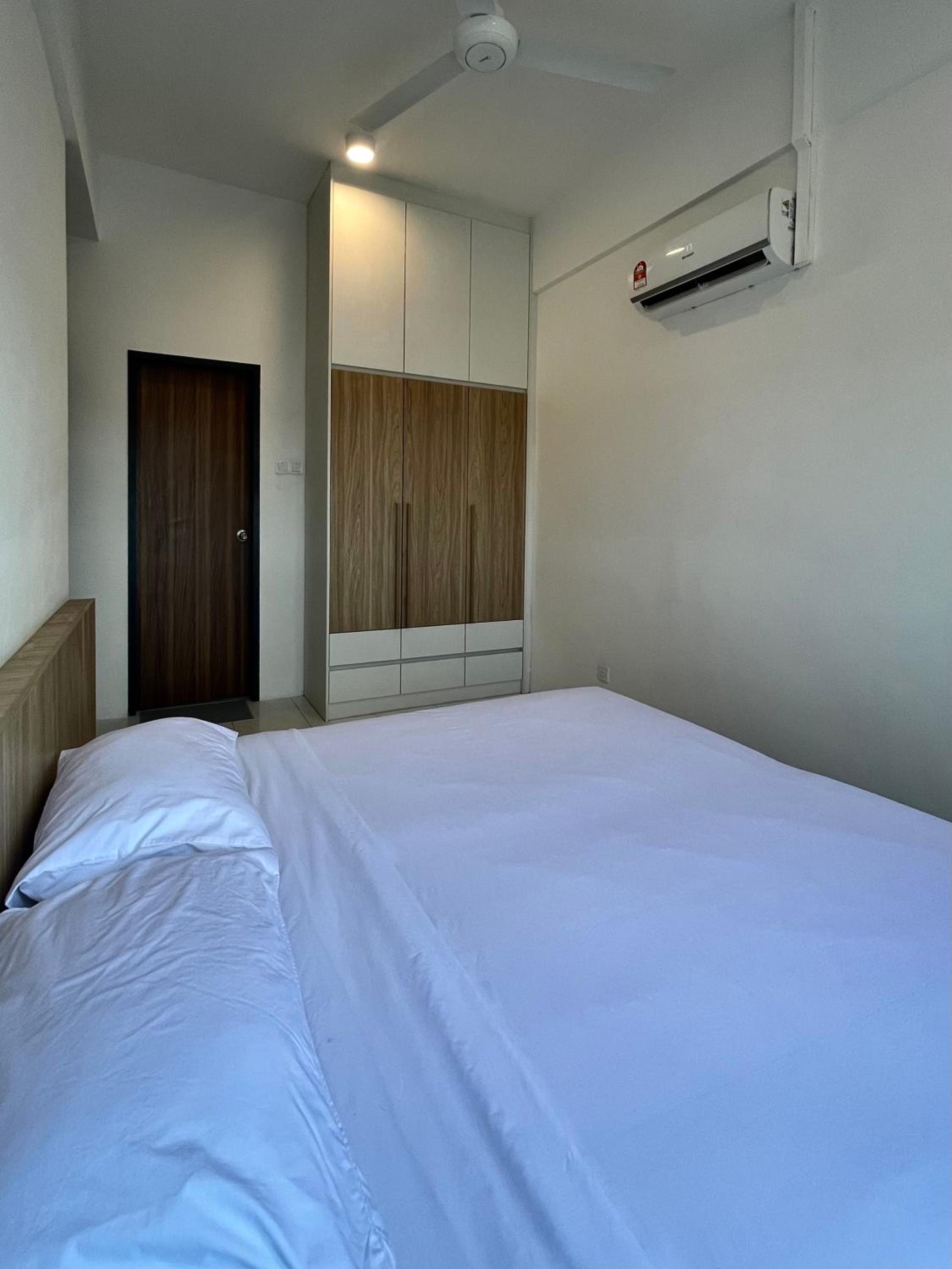 Three-Bedroom Apartment - Photo 11