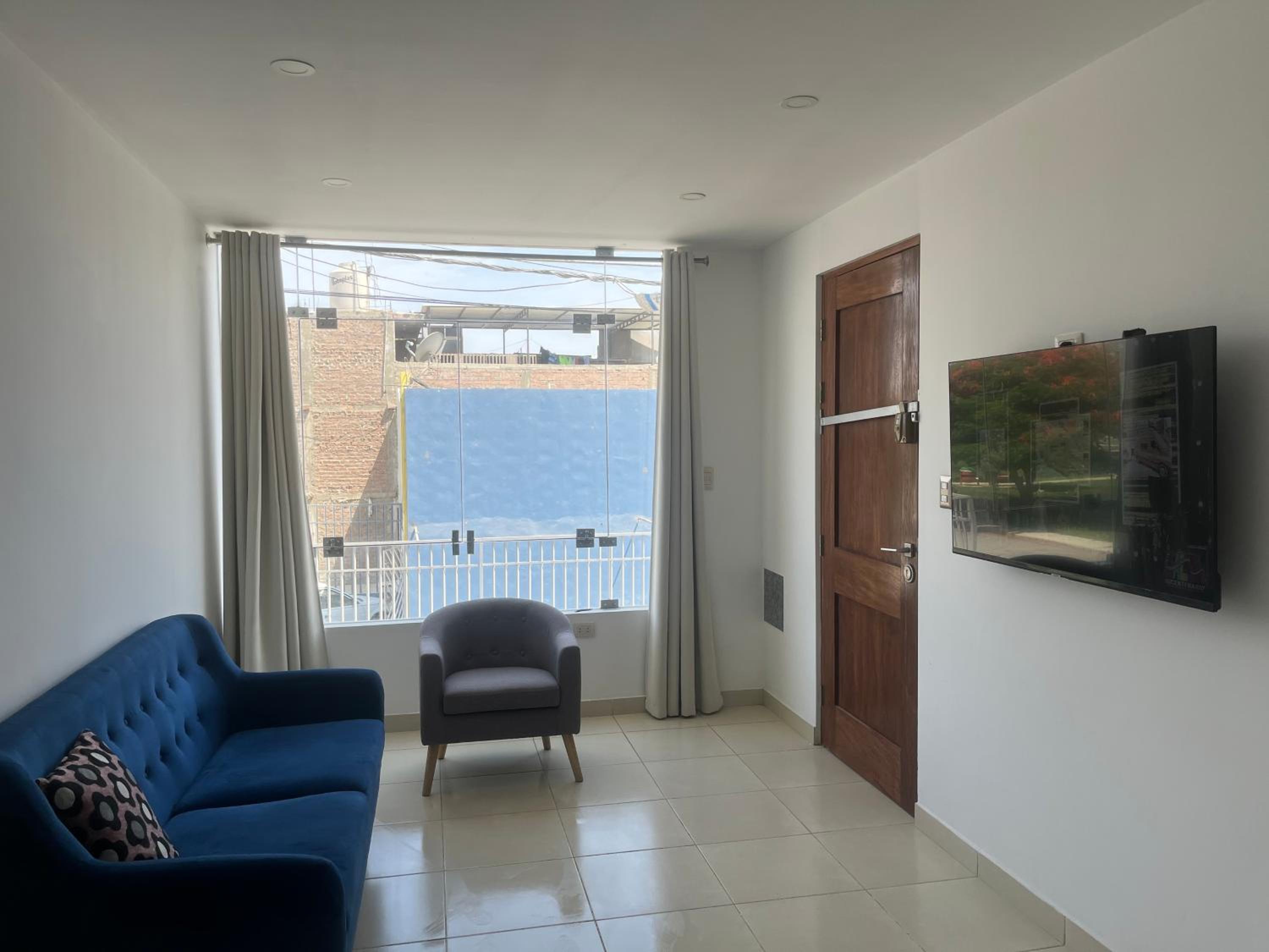 Three-Bedroom Apartment photo 1