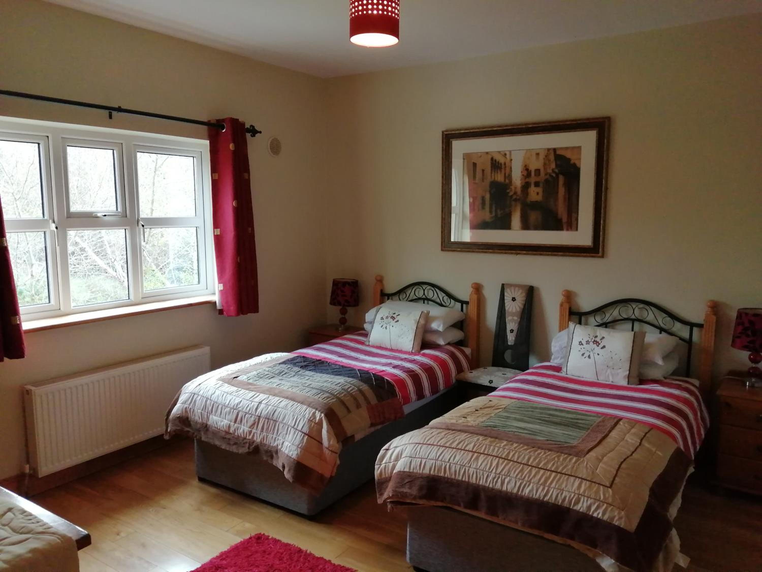 Three-Bedroom House - Photo 22