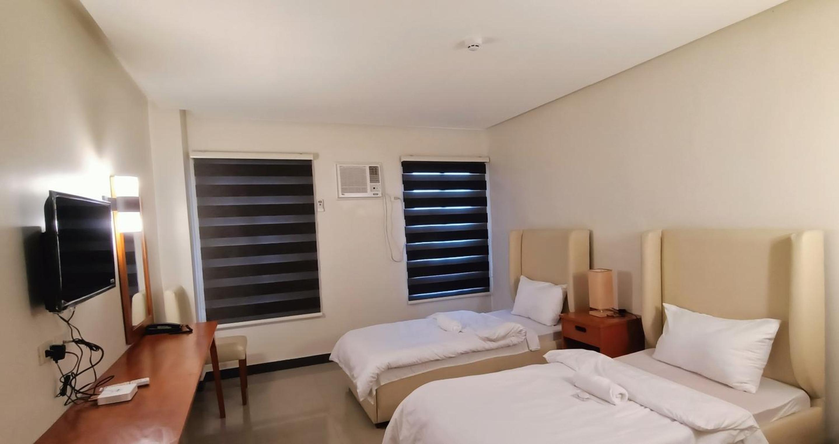 Standard Twin Room - Photo 4