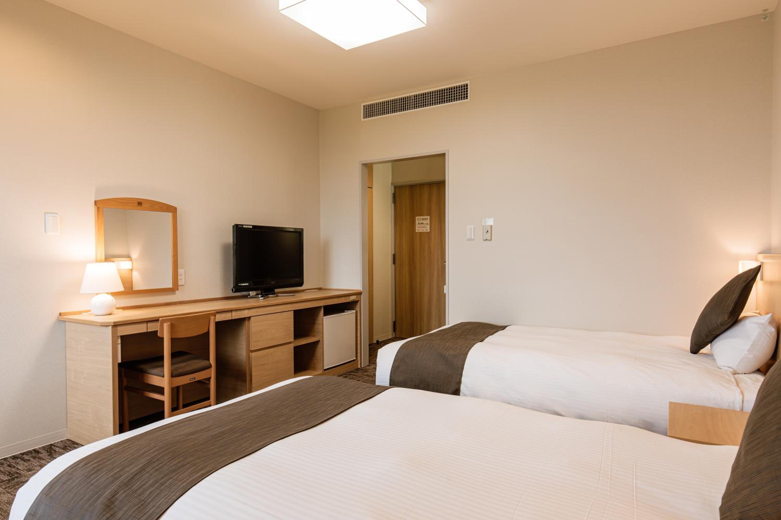 Standard Twin Room - Photo 2