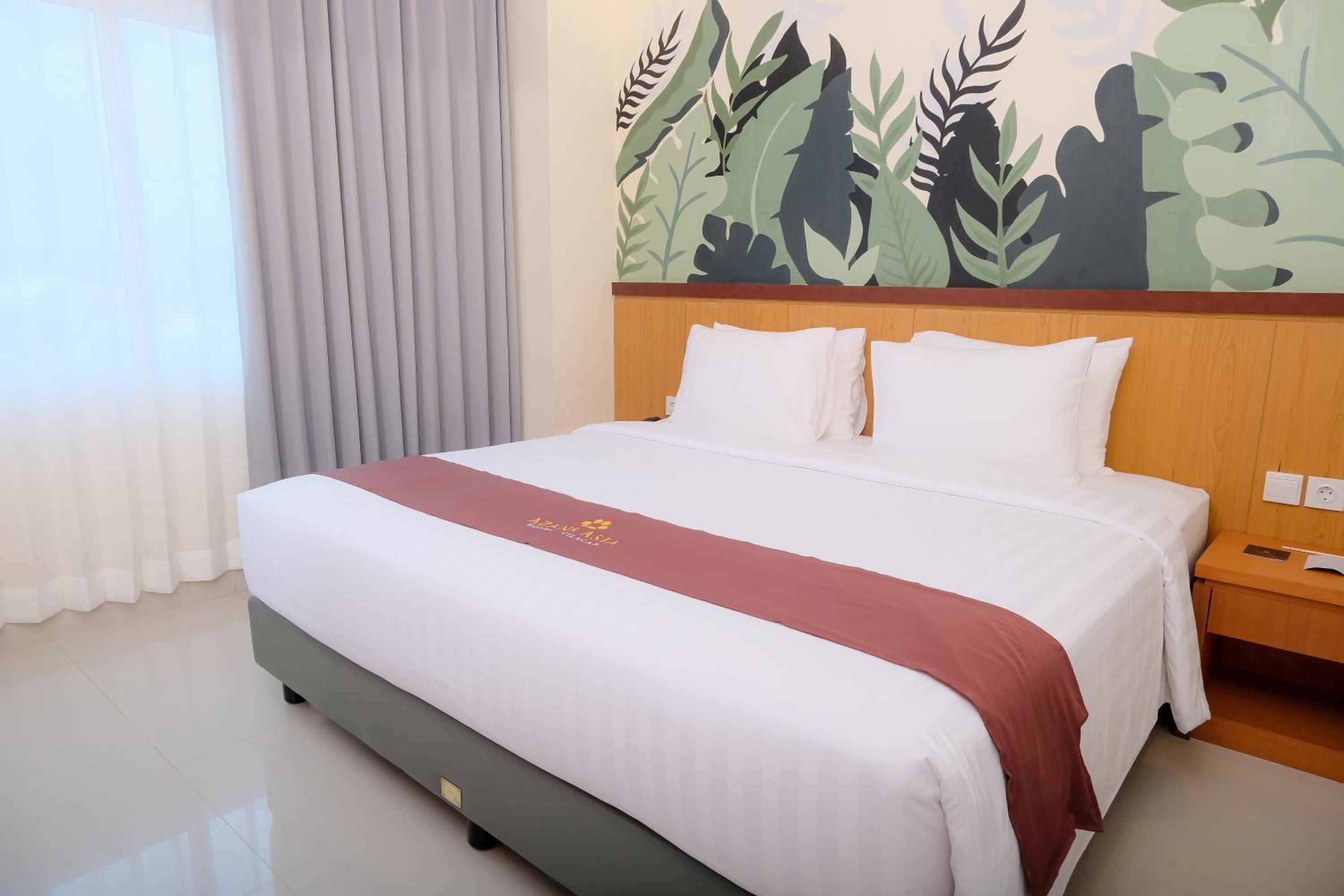 Deluxe King Room - Photo 7