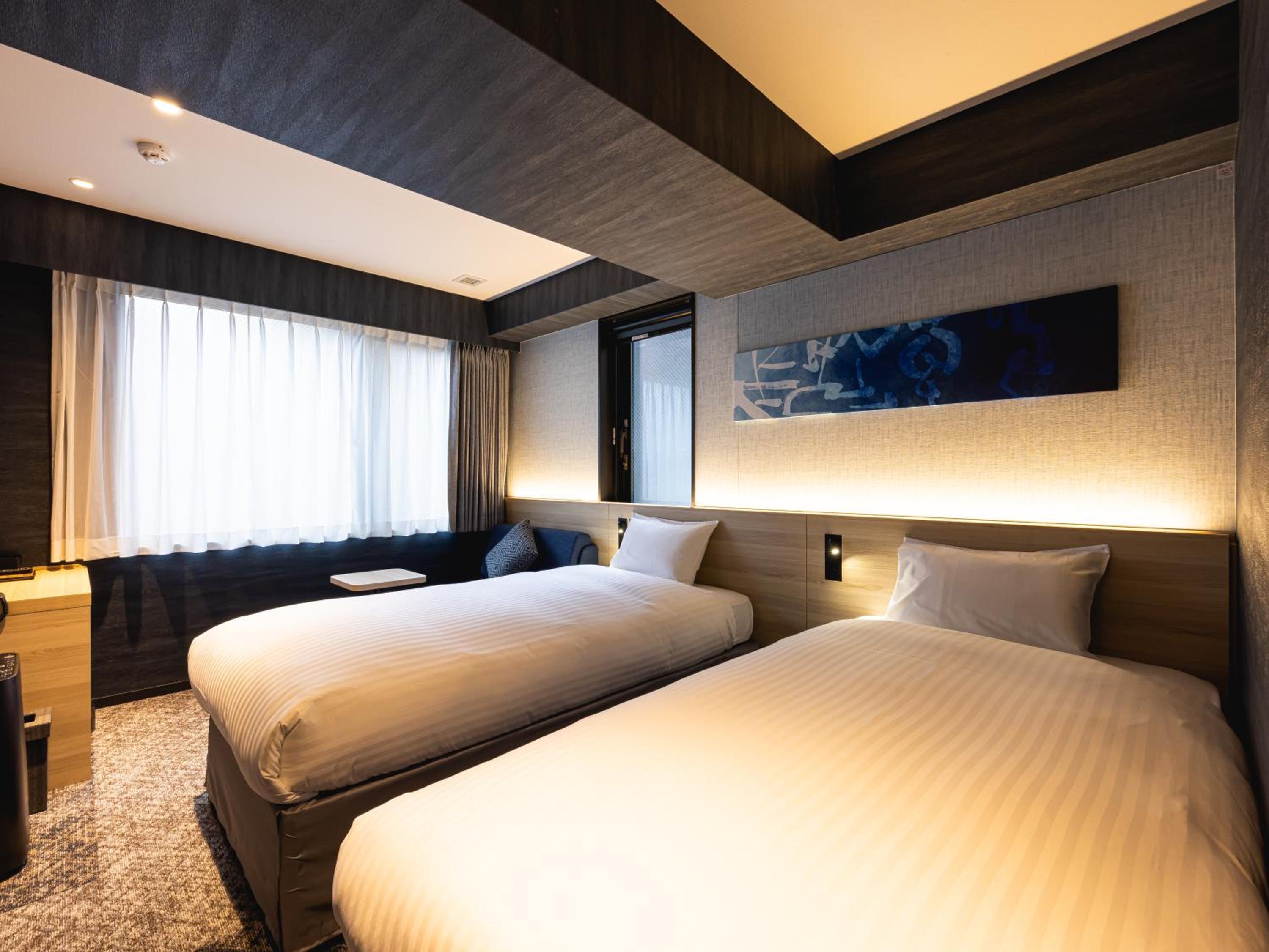 Standard Twin Room - Photo 8