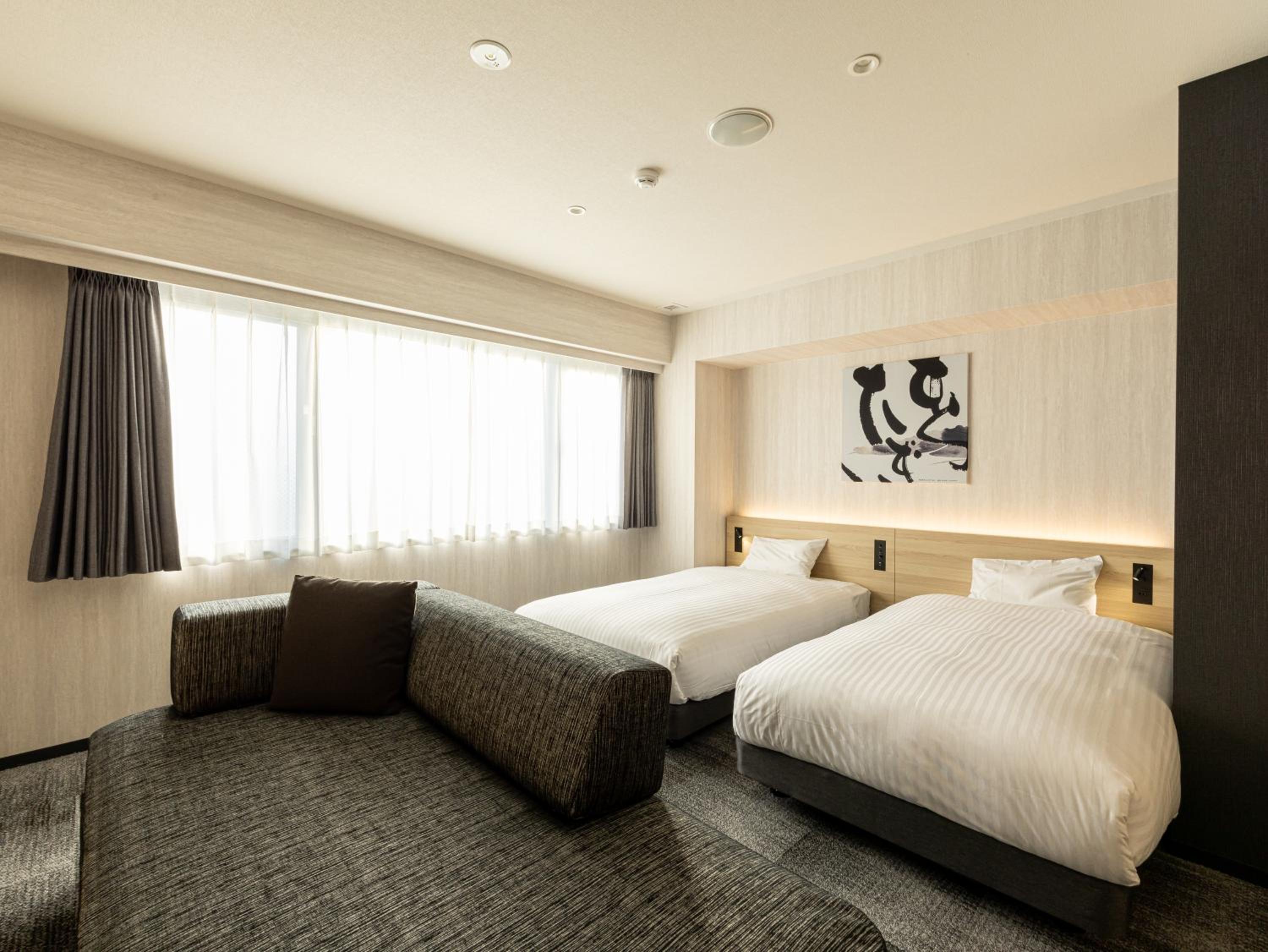 Premium Twin Room - Photo 15
