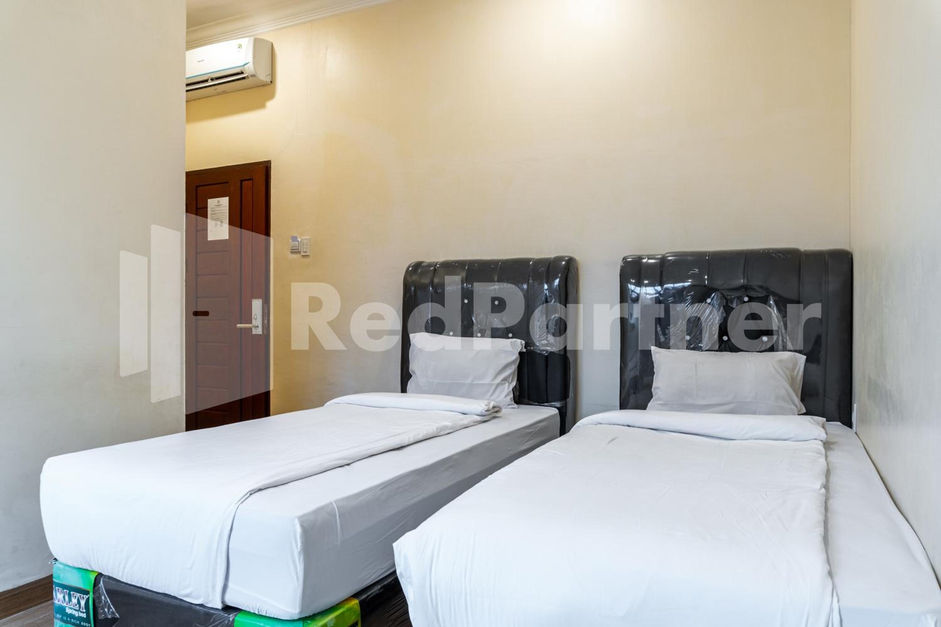 Twin Room - Photo 1