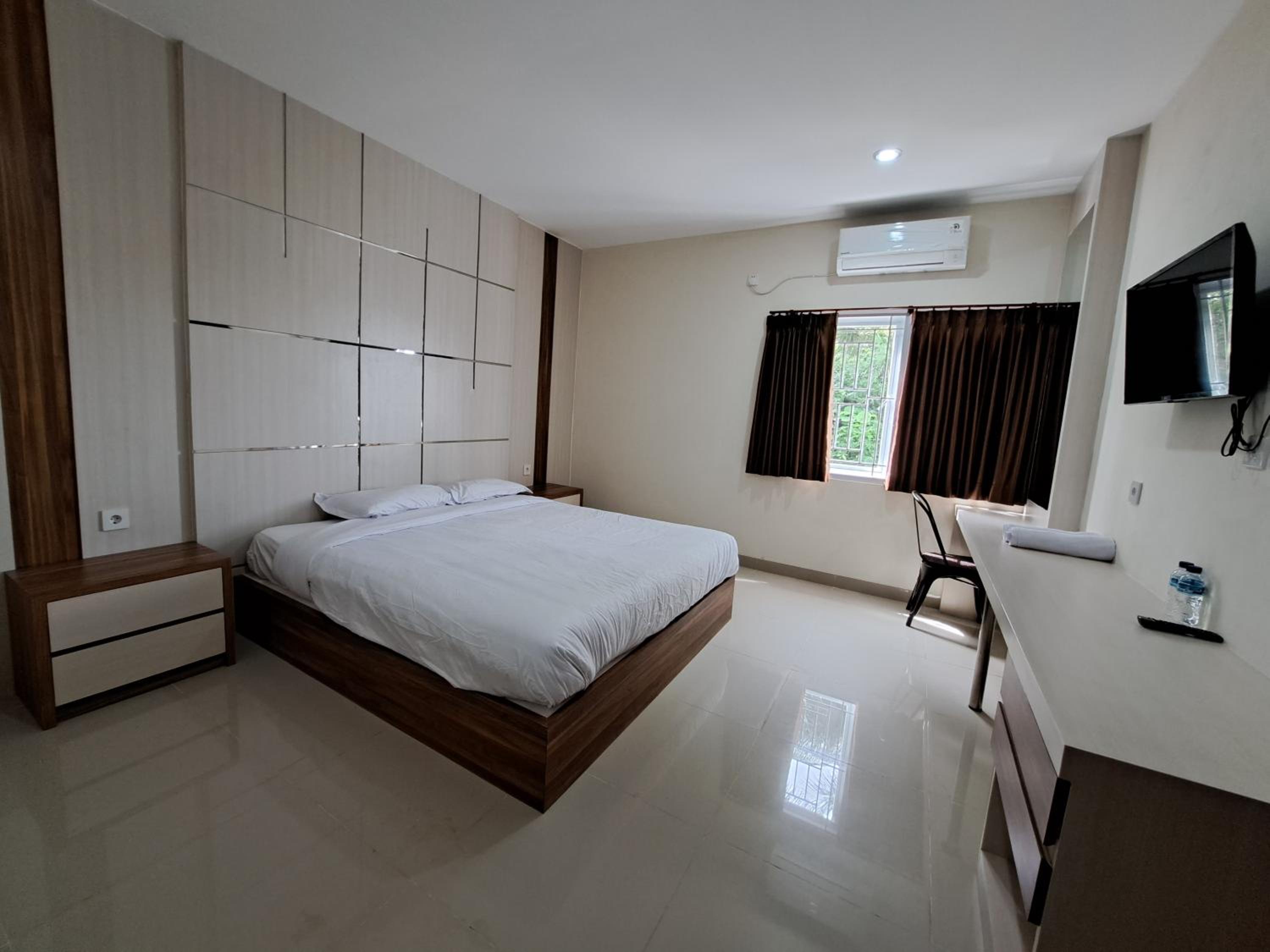 Deluxe King Room - Photo 4