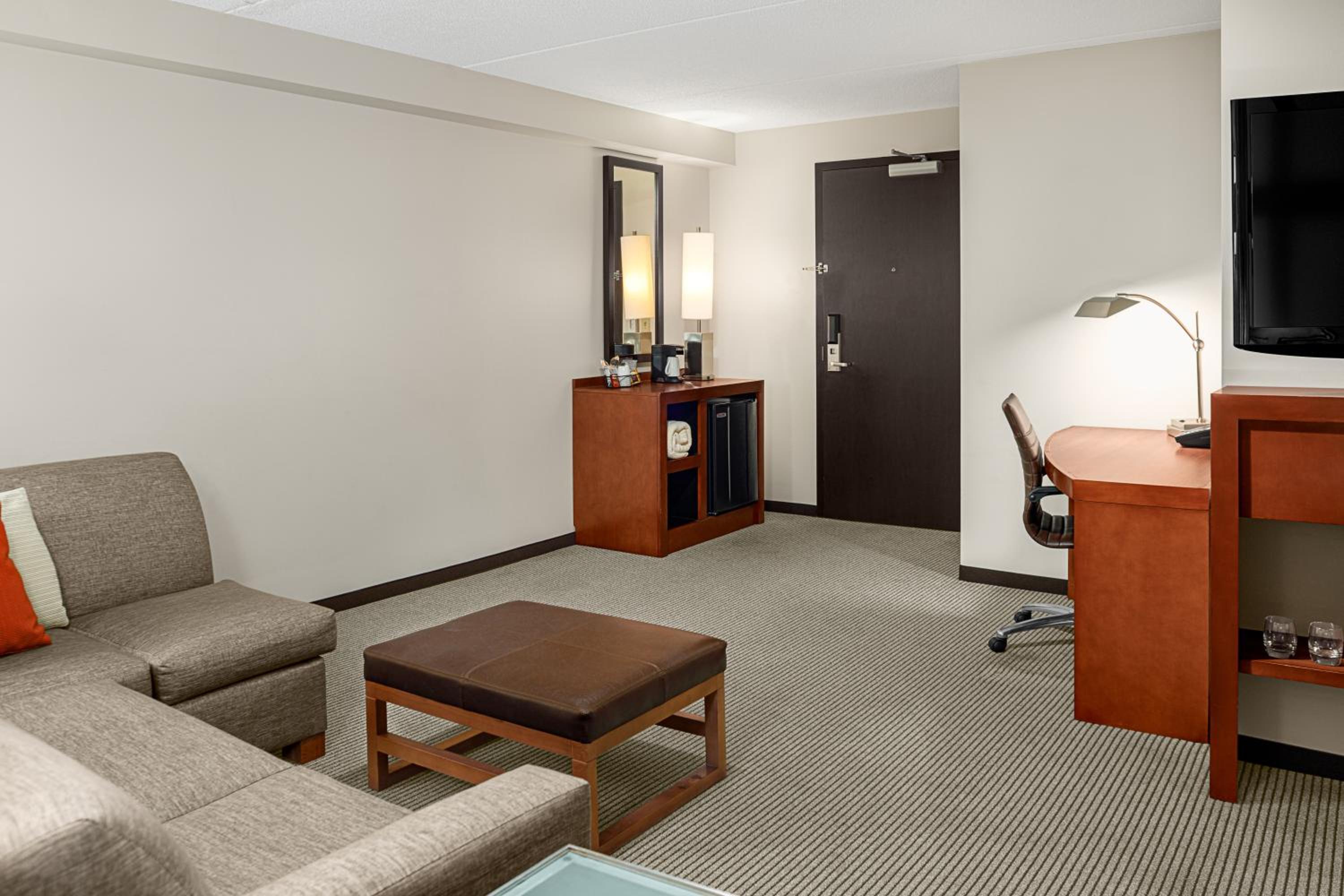 Specialty Corner King Room with Sofa Bed - Photo 4