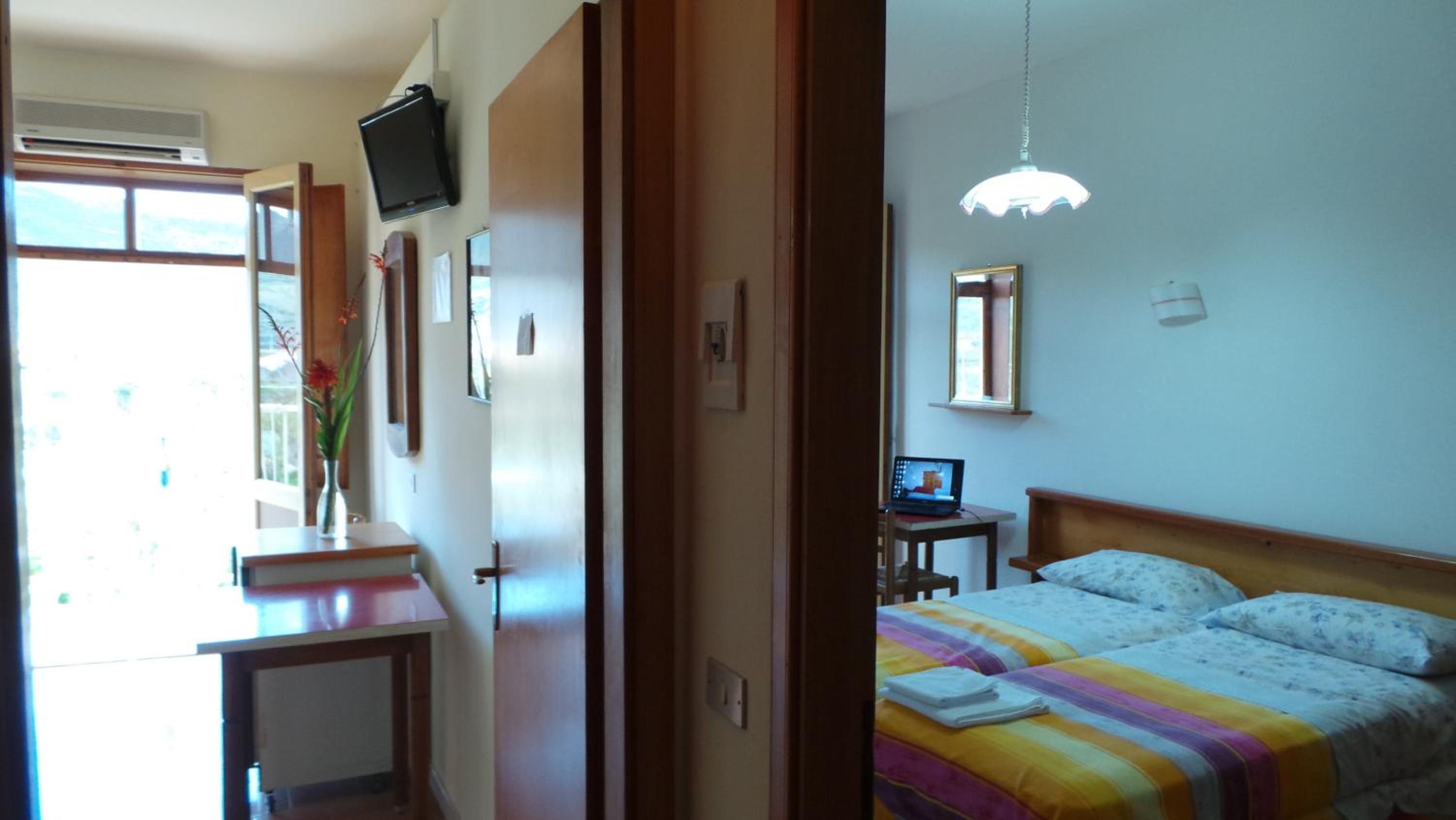 Two Connecting Rooms (5 Adults) photo 1