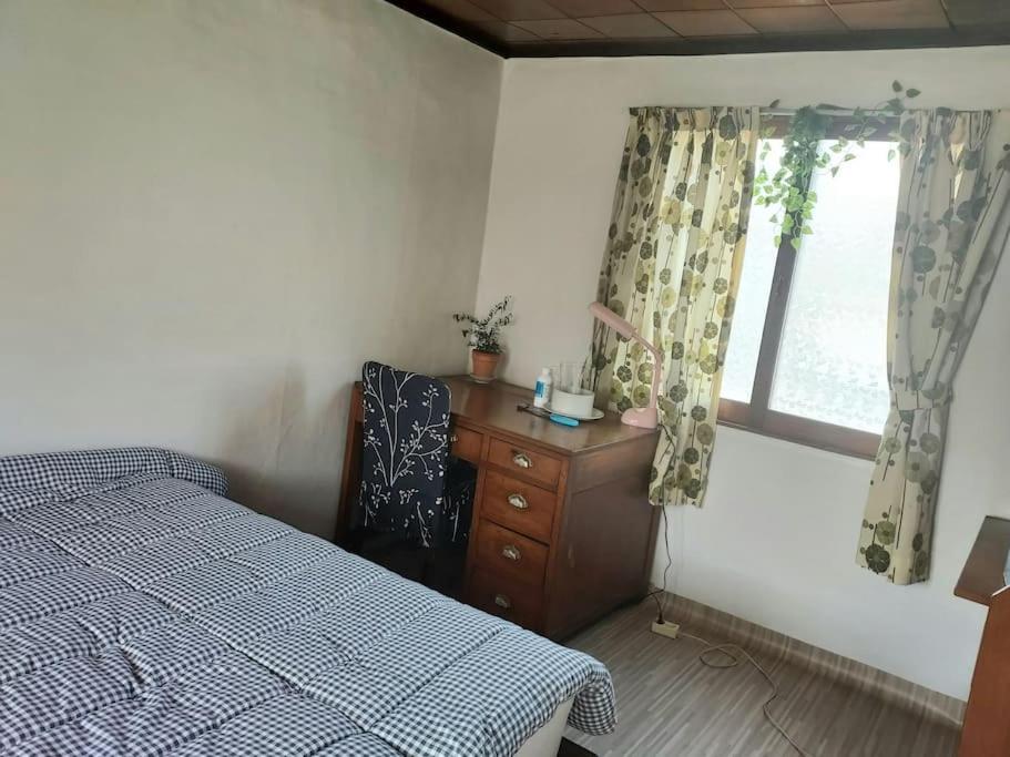 Three-Bedroom House - Photo 23