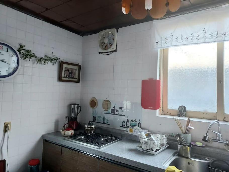 Three-Bedroom House - Photo 31