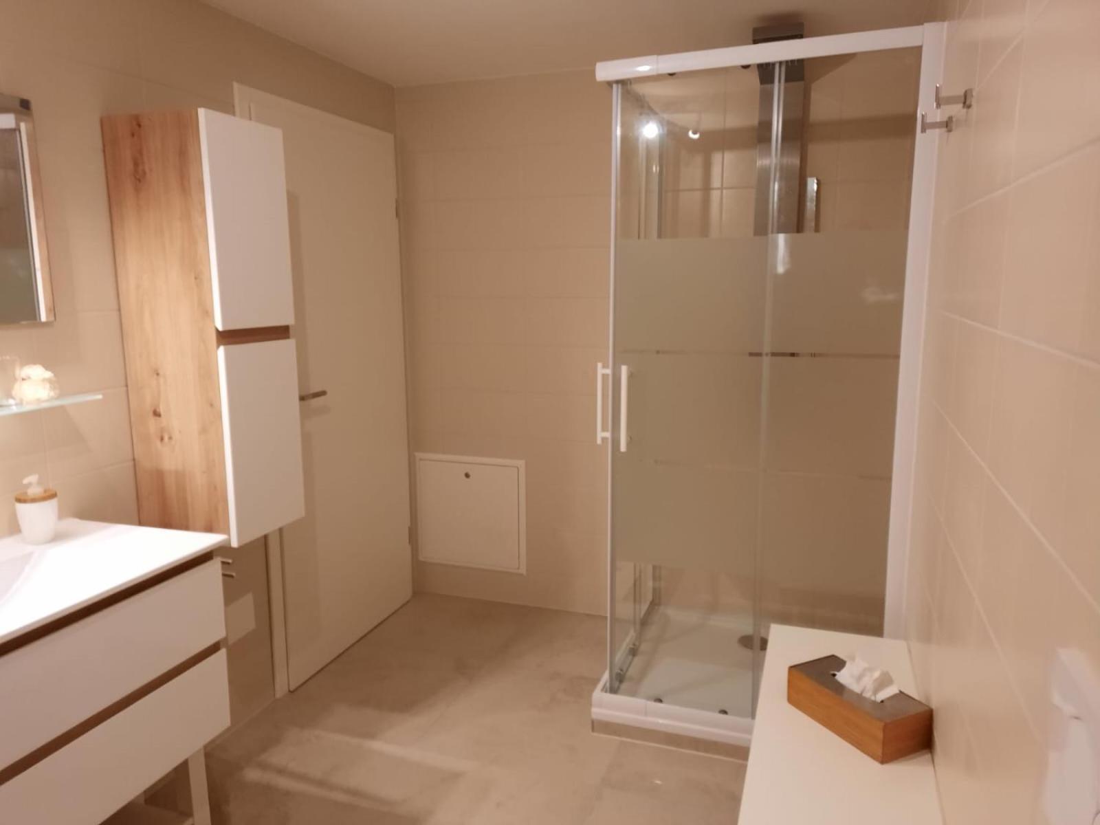 Three-Bedroom Apartment - Photo 32