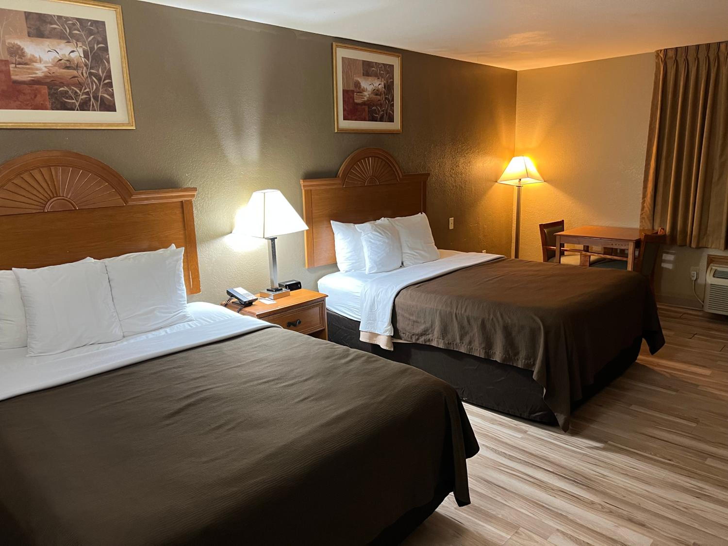 Queen Room with Two Queen Beds - Smoking - Photo 1
