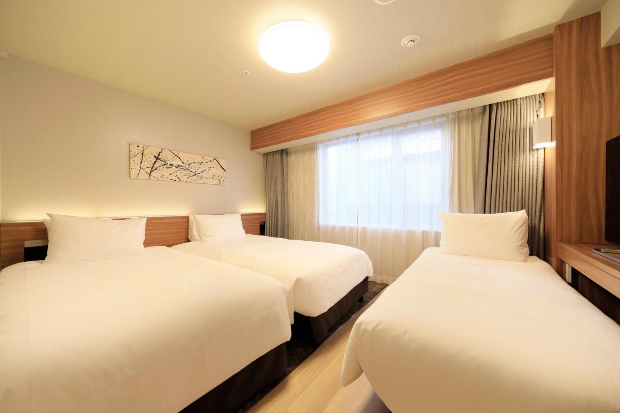 Twin Room with 1 Extra Bed photo 1