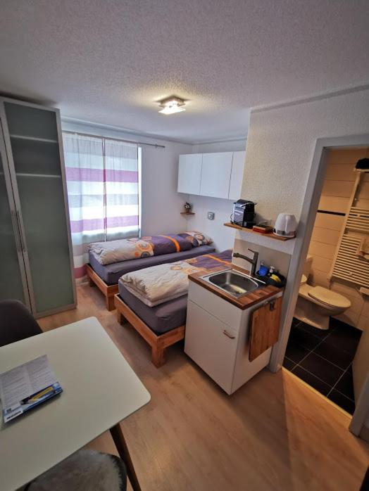 Twin Room with Kitchenette - Photo 11