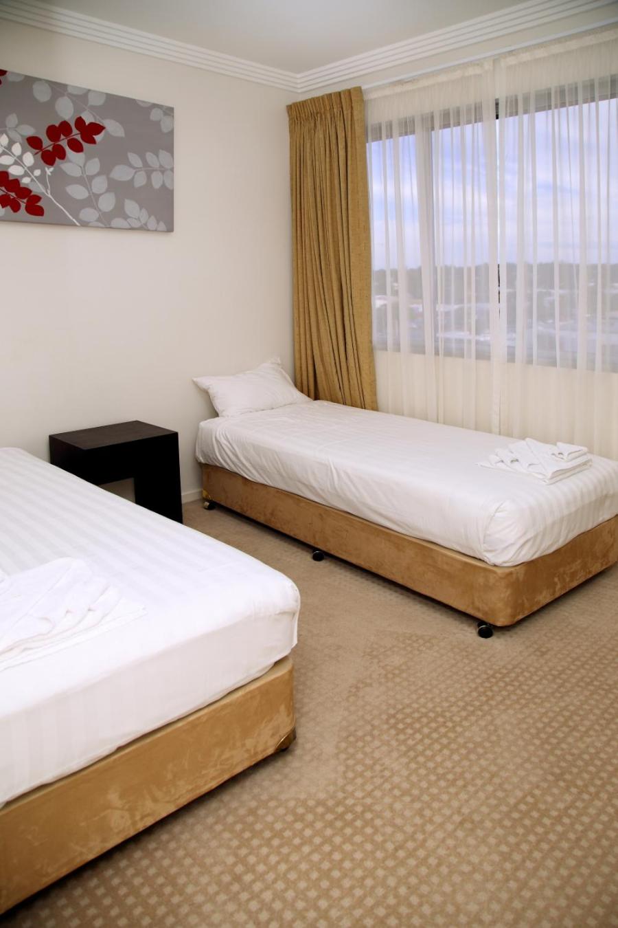 Three-Bedroom Apartment - Photo 10